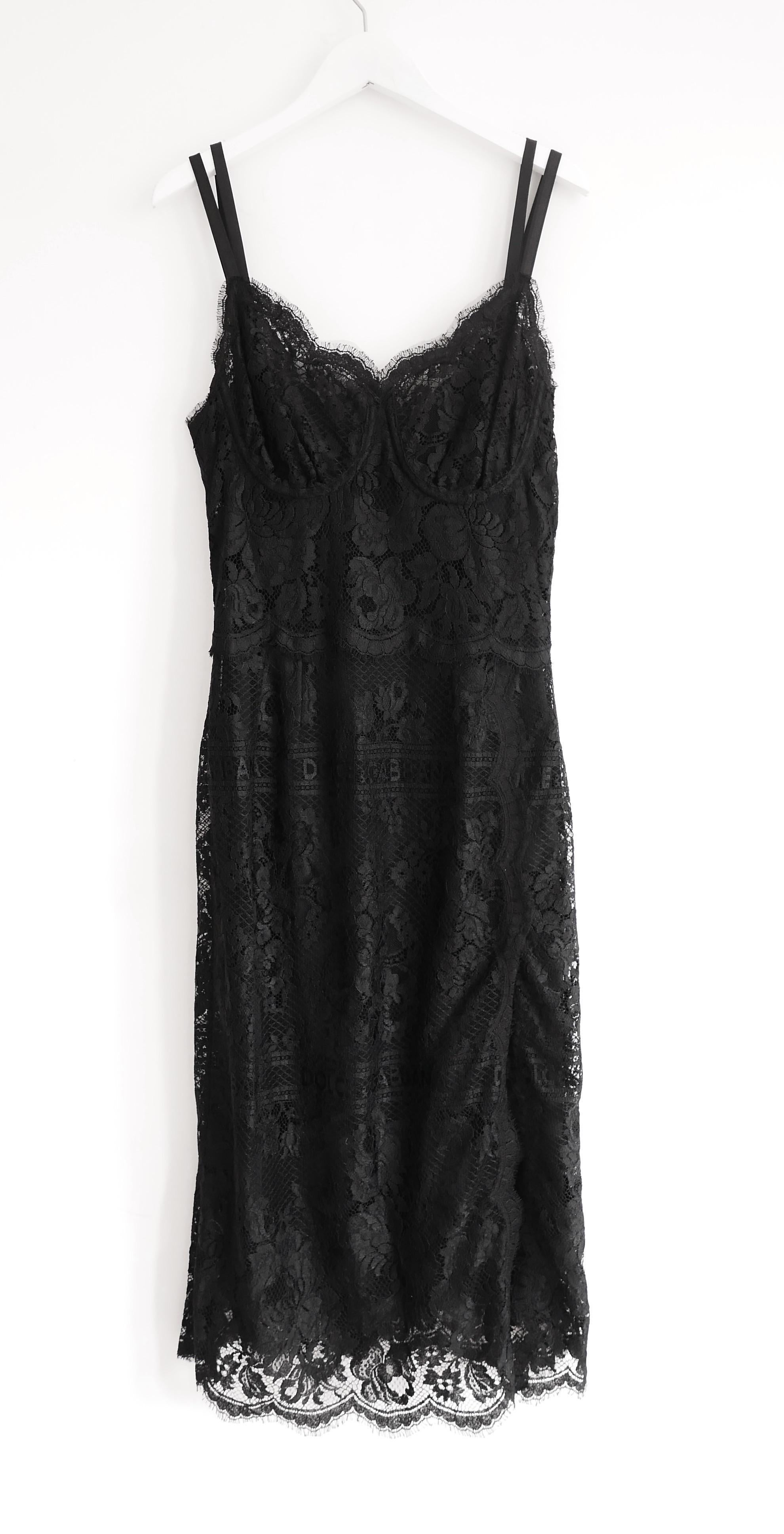 Super sexy, current collection Dolce & Gabbana black lace slip dress from their limited edition Hot Stuff capsule collection. Bought for £1850 and new with tags. 

Made from soft black lace with floral and subtle logo weave. It has separate silk