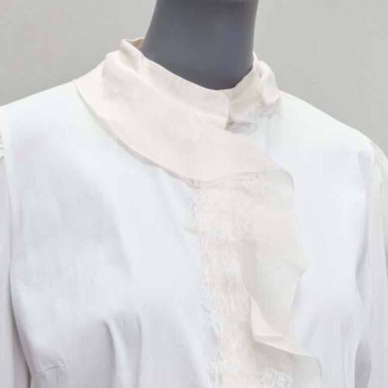DOLCE GABBANA ivory lace ruffle collar long sleeve fitted dress shirt IT46 XL
Reference: GIYG/A00345
Brand: Dolce Gabbana
Designer: Domenico Dolce and Stefano Gabbana
Material: Cotton, Blend
Color: Cream
Pattern: Solid
Closure: Button
Extra Details: