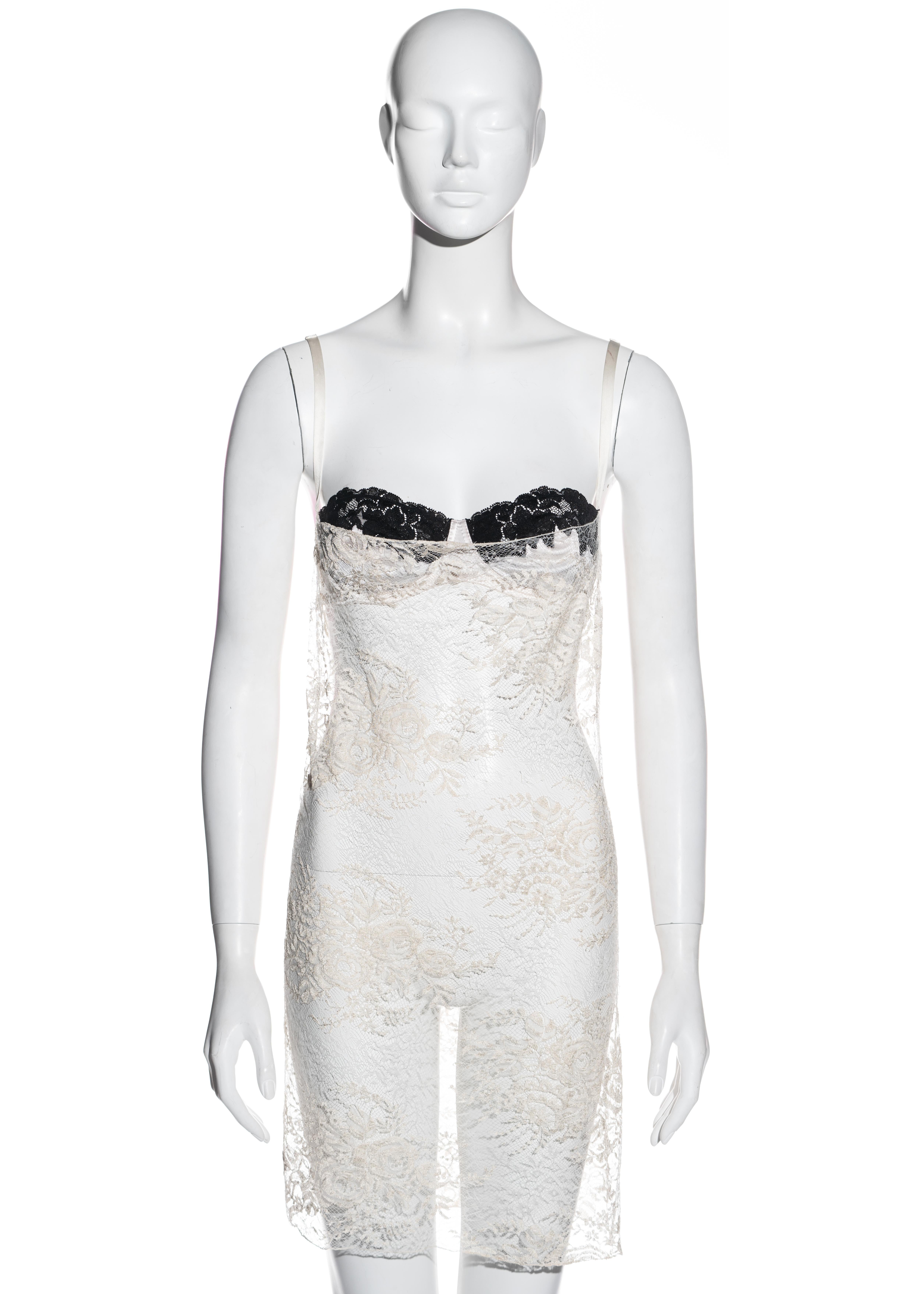 ▪ Dolce & Gabbana ivory lace slip dress
▪ 90% Rayon, 10% Nylon
▪ Attached satin bra edged with black lace 
▪ Invisible side zip fastening 
▪ IT 42 - FR 38 - UK 10 - US 6
▪ Fall-Winter 2001