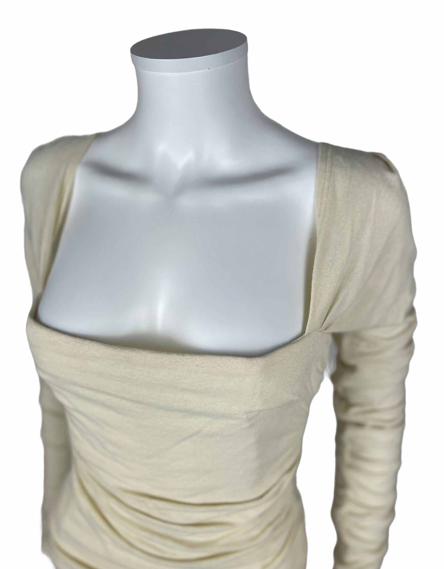 Dolce & Gabbana dress, made in Italy. 
Cream tonal Party Dress in viscose and wool with a corset structure inside and a beautiful satin lining. 
The fabric is stretch and has a light drapé wich gives a beautiful line to the body. 
Size tag is IT44,