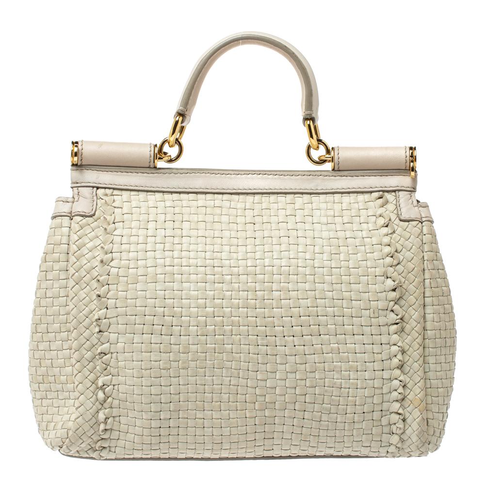 The Miss Sicily tote is one of the most celebrated creations from Dolce & Gabbana. The tote beautifully embodies the spirit of extravagance and feminity that the Italian luxury brand carries. Crafted from woven leather, the bag has a relaxed design