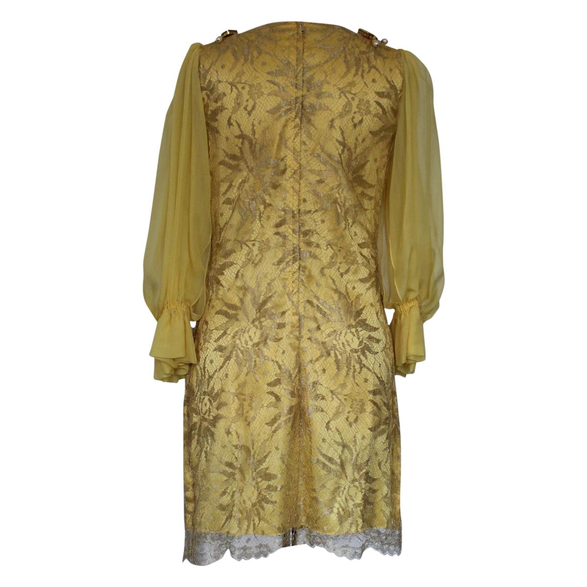 Super chic dress by Dolce & Gabbana
Lurex (62%) Silk (30%) Nylon
Yellow color
Silk sleeves
Faux pearls and crystals embellishment
Total length cm 86 (33.8 inches)
Shoulders cm 32 (12.5 inches)
Worldwide express shipping included in the price !
