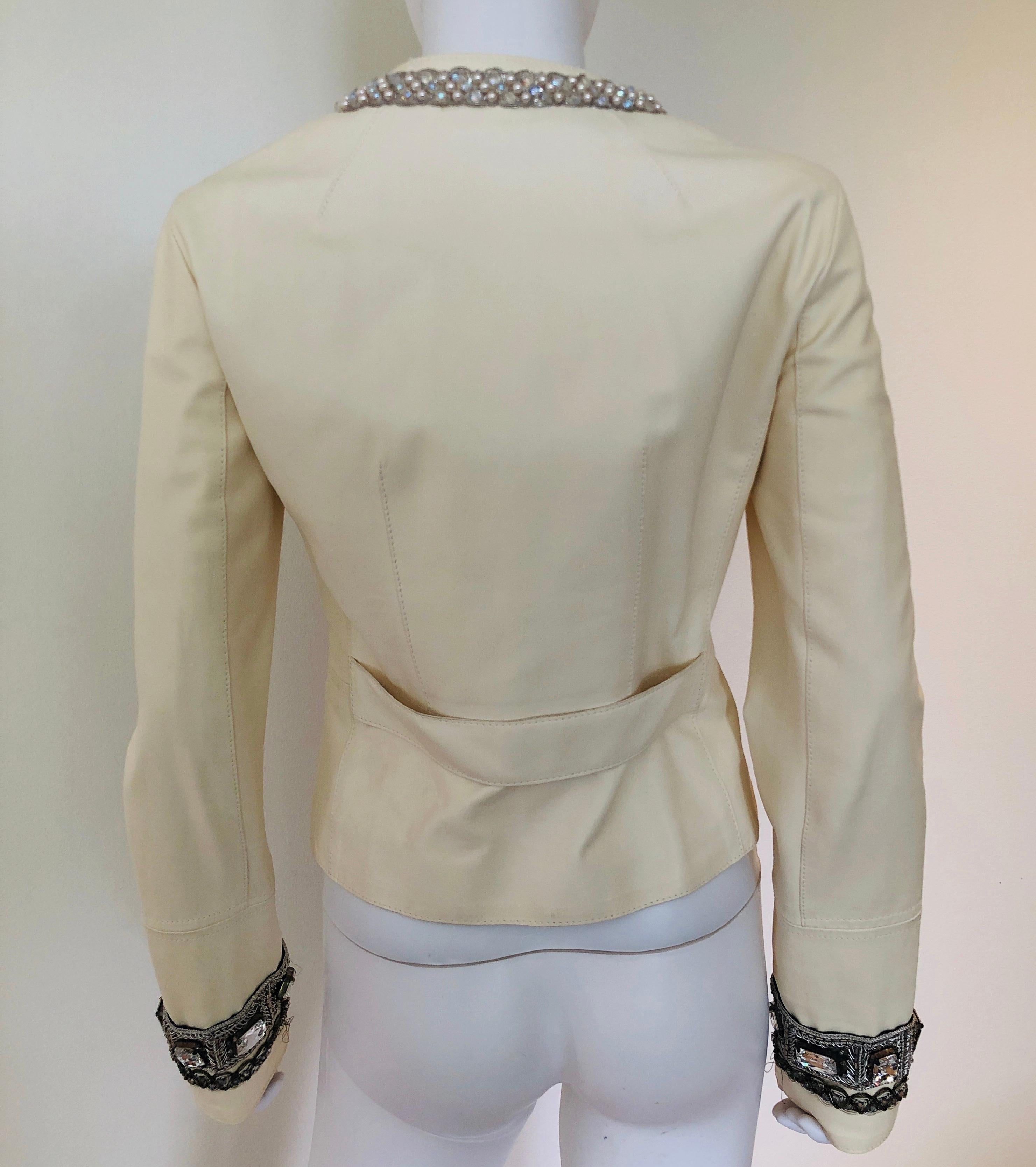 Signed Dolce & Gabbana jewel embellished fitted short off white / ivory lambskin evening 
    jacket / bar jacket
Extremely rare find / Runway
Made in Italy
Italian size 42
JLSSA  /9150  Agnello lambskin
Antique black and gray embroidered thread