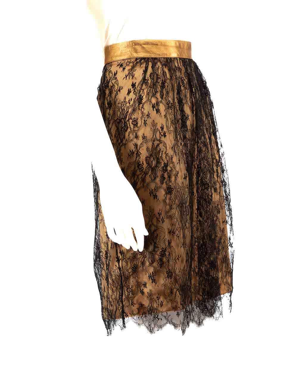 CONDITION is Good. Minor wear to the skirt is evident. Light signs of wear and abrasion to the back waistband of the skirt on this used Dolce & Gabbana designer resale item.
 
 
 
 Details
 
 
 Multicolour- gold, black
 
 Viscose
 
 Skirt
 
 Knee