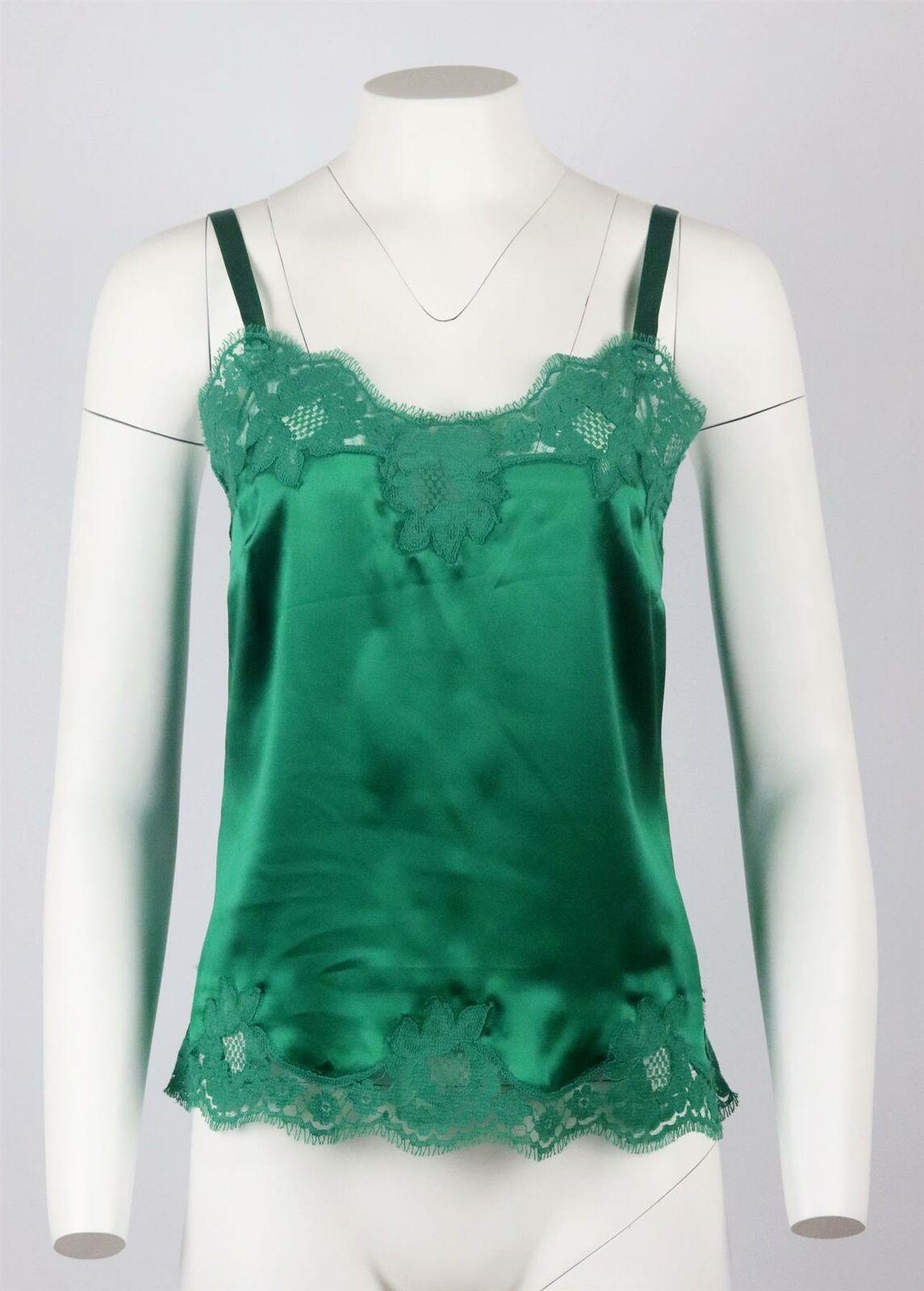 Expertly handcrafted in Italy, Dolce & Gabbana's camisole is made from lustrous silk-satin in a rich green hue, it's trimmed with lace in a matching green tone.
Green silk-satin, green lace.
Slips on.
80% Silk, 12% cotton, 5% elastane, 3%