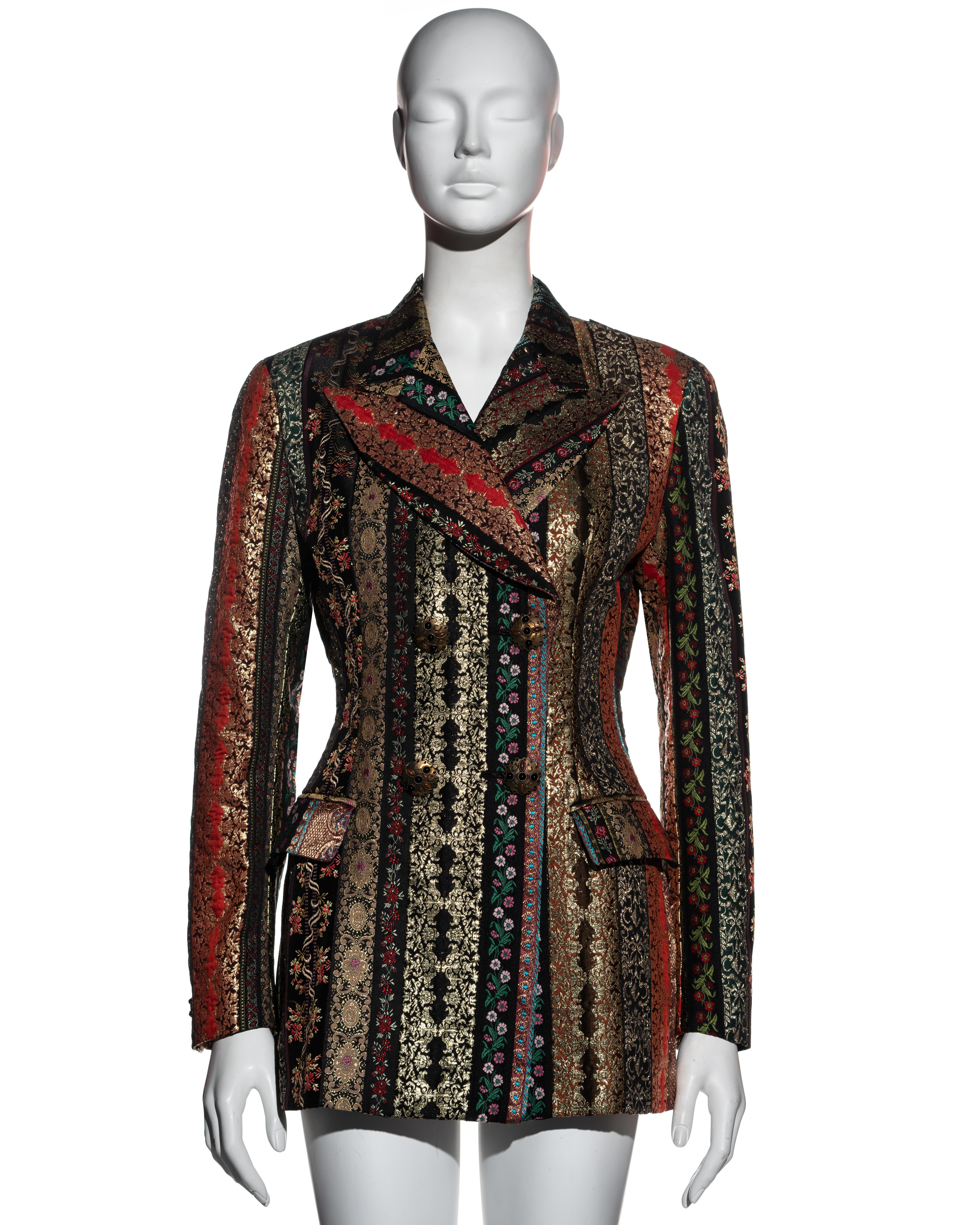 ▪ Dolce & Gabbana multicoloured double-breasted blazer jacket
▪ The textile consists of a patchwork of colourful lamé brocades and floral jacquards 
▪ Large antique-style metal buttons
▪ 2 front flap pockets
▪ Peak lapels 
▪ Accentuated waist
▪ IT