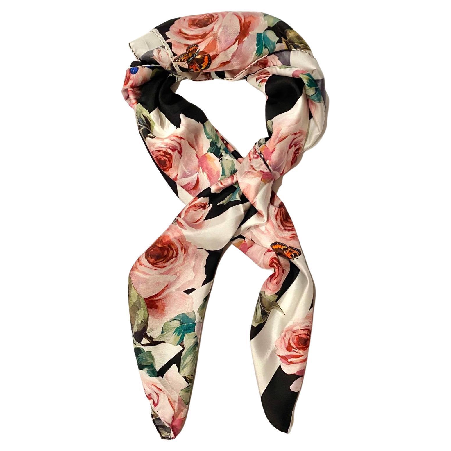 Dolce & Gabbana twill scarf on black and white stripe background and pink rose print, hand stitched, Made in Ital This scarf is crafted with care and attention to detail, offering a luxurious and elegant look. Soft and light in weight, it's perfect