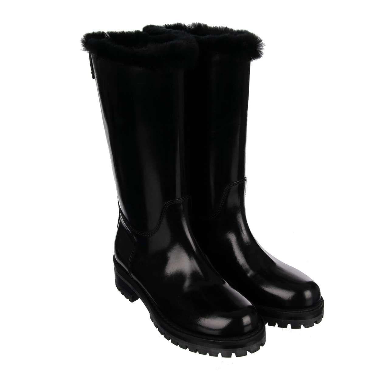- Leather Boots BIKER with fur trim and Dolce&Gabbana logo on the back in black by DOLCE & GABBANA - MADE IN ITALY - New with Box - Model: CT0224-AB537-80999 - Material: 90% Calf leather, 10% Rabbit fur - Sole: Rubber - Color: Black - Rabbit fur