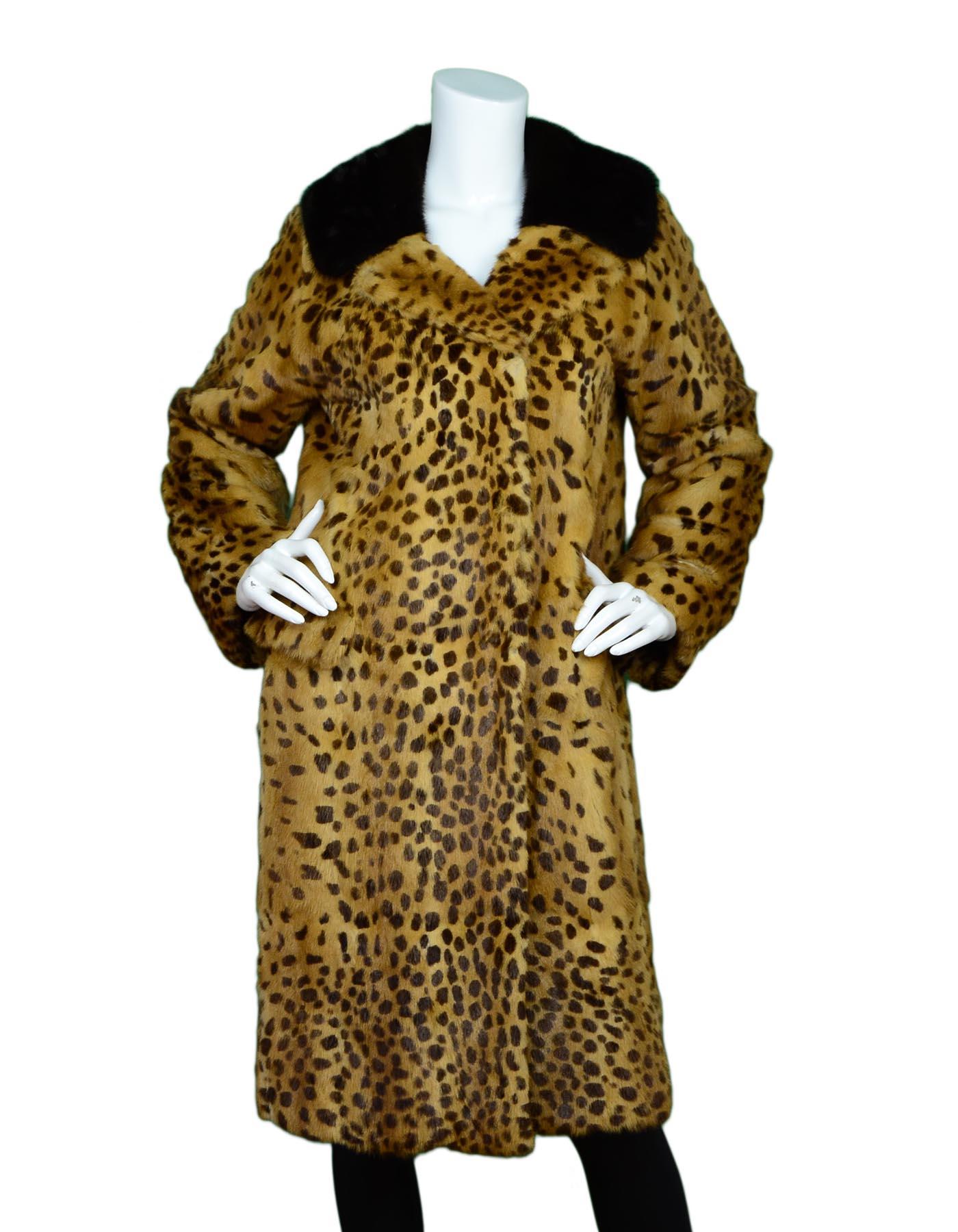 Dolce & Gabbana Leopard Print Fox Fur Coat Sz L

Color: Black, brown
Materials: Fox fur (no composition tag)
Lining: Black logo textile
Opening/Closure: Hook eye closure
Overall Condition: Excellent pre-owned condition with exception of no