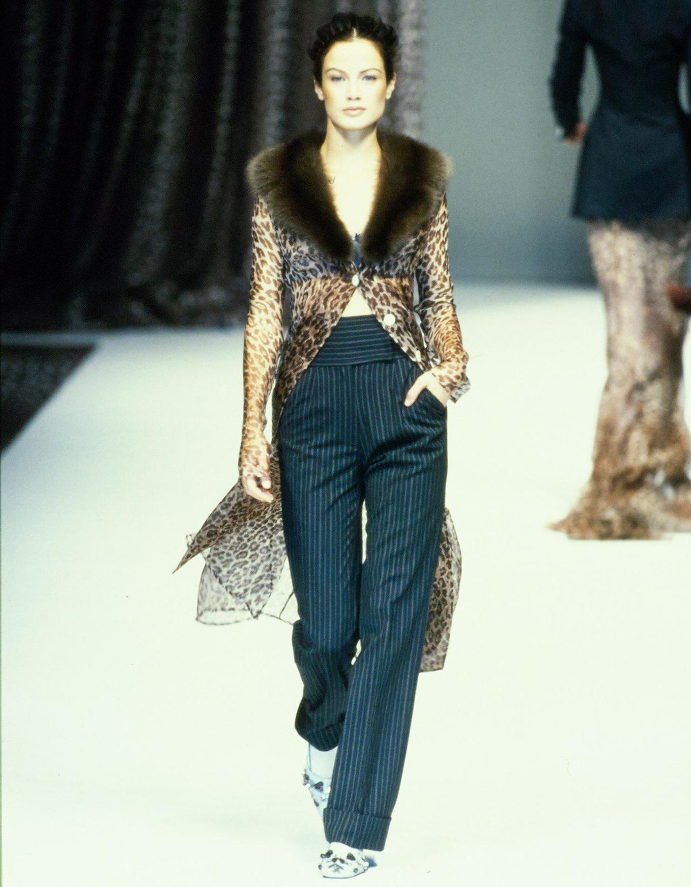 Dolce & Gabbana brown leopard print evening coat with mink fur collar and large logo engraved buttons.

Spring-Summer 1997