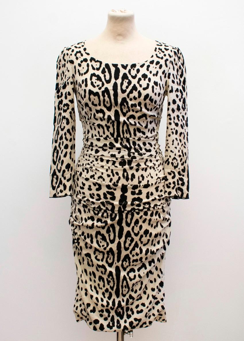 Dolce and Gabbana leopard silk dress. 

- Scoop neck line. 
- Three-quarter length sleeves. 
- Silk lining. 
- Ruched detail on the side. 
- Concealed back zip. 


Size IT 40

Approx. 
Measurements are taken with the item lying flat, seam to