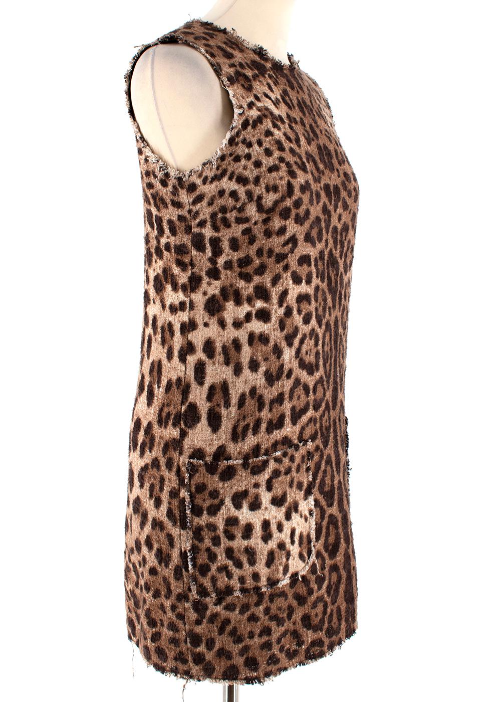 Dolce & Gabbana Leopard Print Dress

- Black silk lining
- Size 36 IT
- Sleeveless 
- Dolce signature leopard print
- Raw edged neckline, sleeves and skirt bottom
- Back zip with silver hardware
- Textured dress with woven material 
- Patched