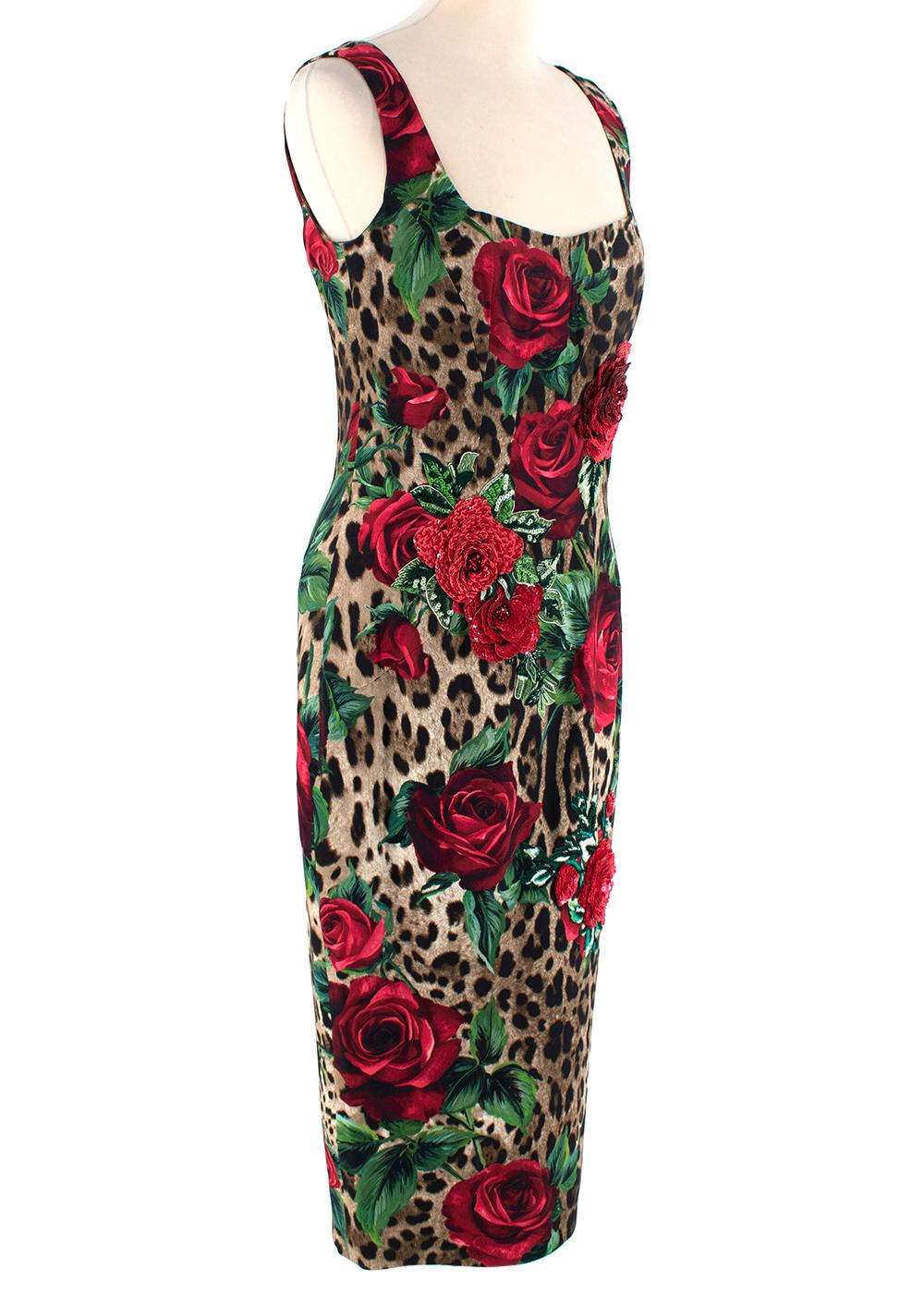 Dolce & Gabbana Leopard Rose Print Bodycon Dress

- Shoulder Straps
- Square neckline
- Fitted design
- Zip-up fastening at the back
- Embellished with an all-over leopard and rose print pattern
- Small split at the end 


Outer Composition: