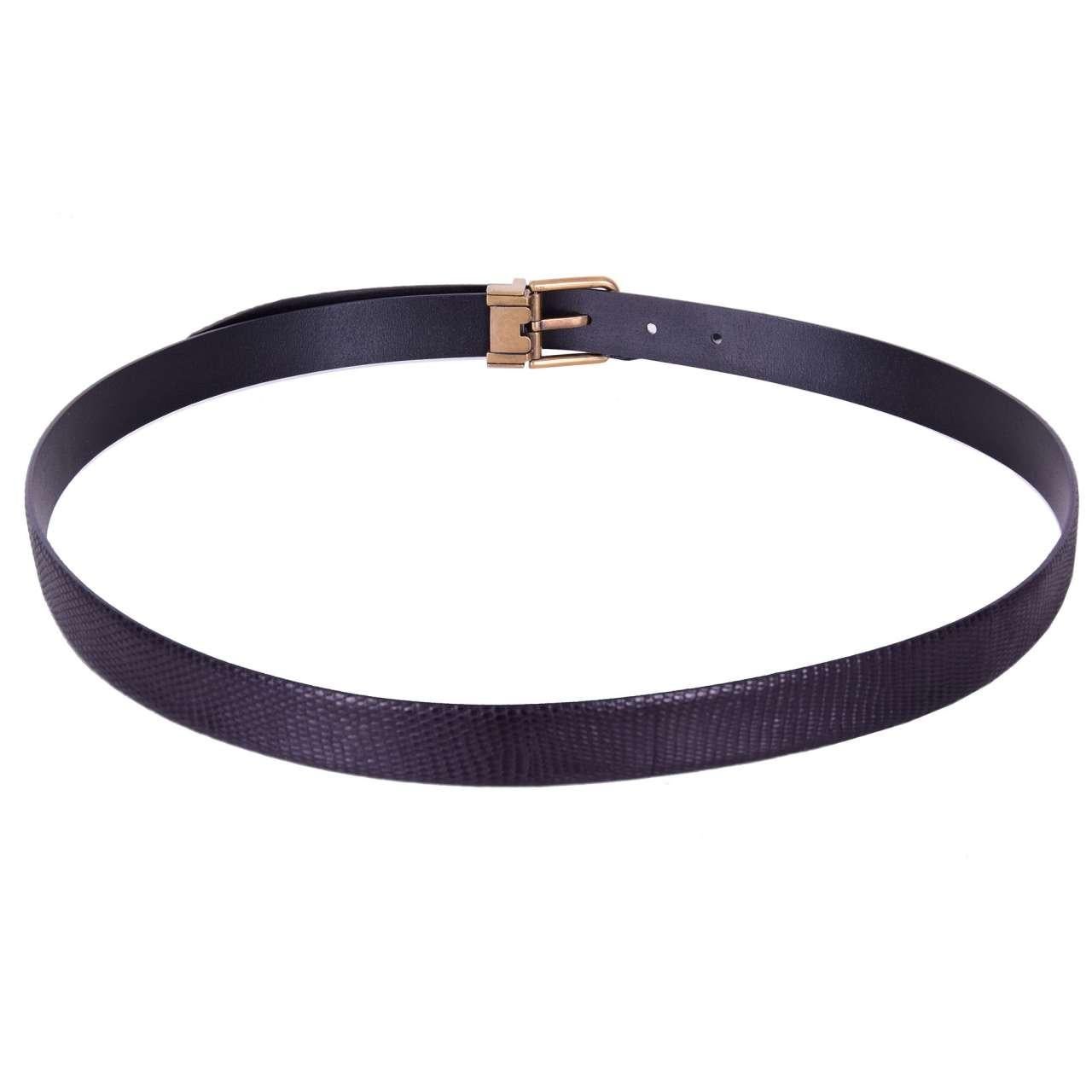 - Lizard belt with removable roller buckle in black by DOLCE & GABBANA Black Label - MADE IN ITALY - New with Dustbag - Model: BC3614-A2312-80999 - Material: 100% Lizard - Width: 2,5 cm - Color: Black - Roller buckle in antique gold - Square pointed