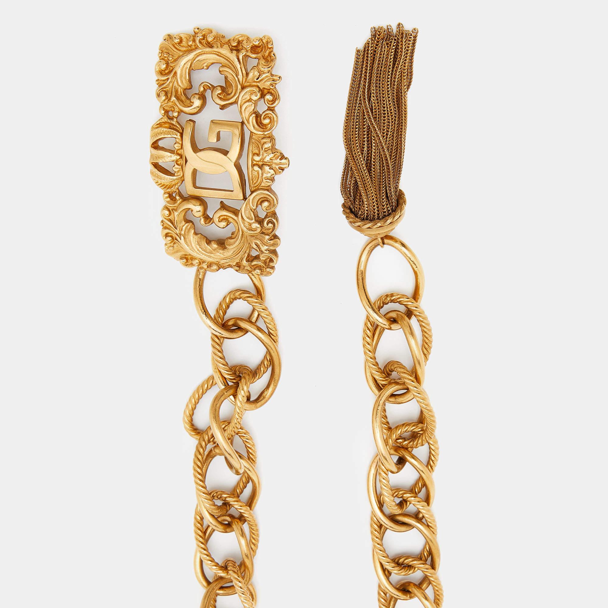 Crafted from gold-tone metal, this authentic Dolce & Gabbana chain belt has a beautiful look and a simple fastening for the desired fit. Use it to cinch blazers and flowy dresses.

Includes: Original Dustbag

