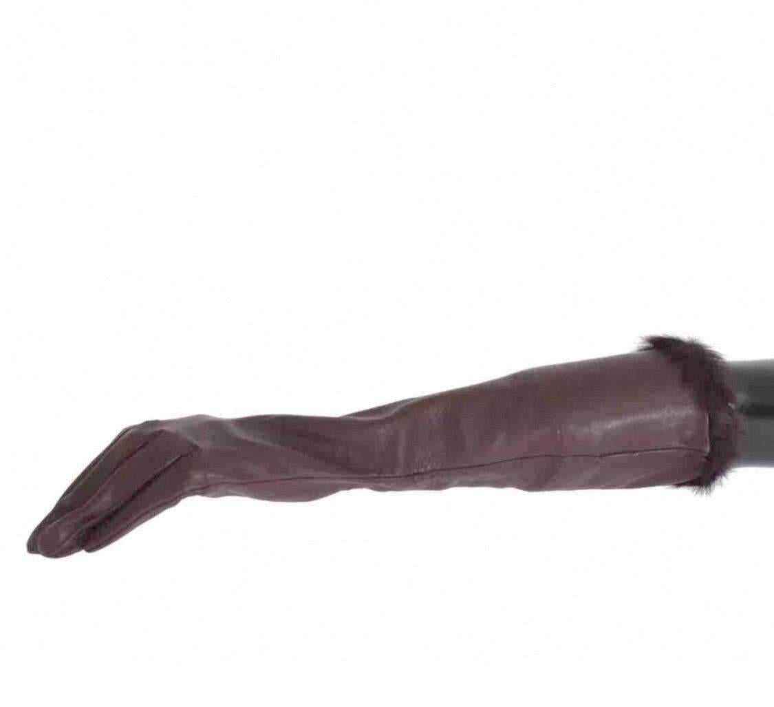 Dolce & Gabbana Long burgundy
lamb leather gloves, size M, 7.5 inches.
100% Agnello.

New with original tag.

Please check my other DG clothing,
bags, shoes & accessories! 
