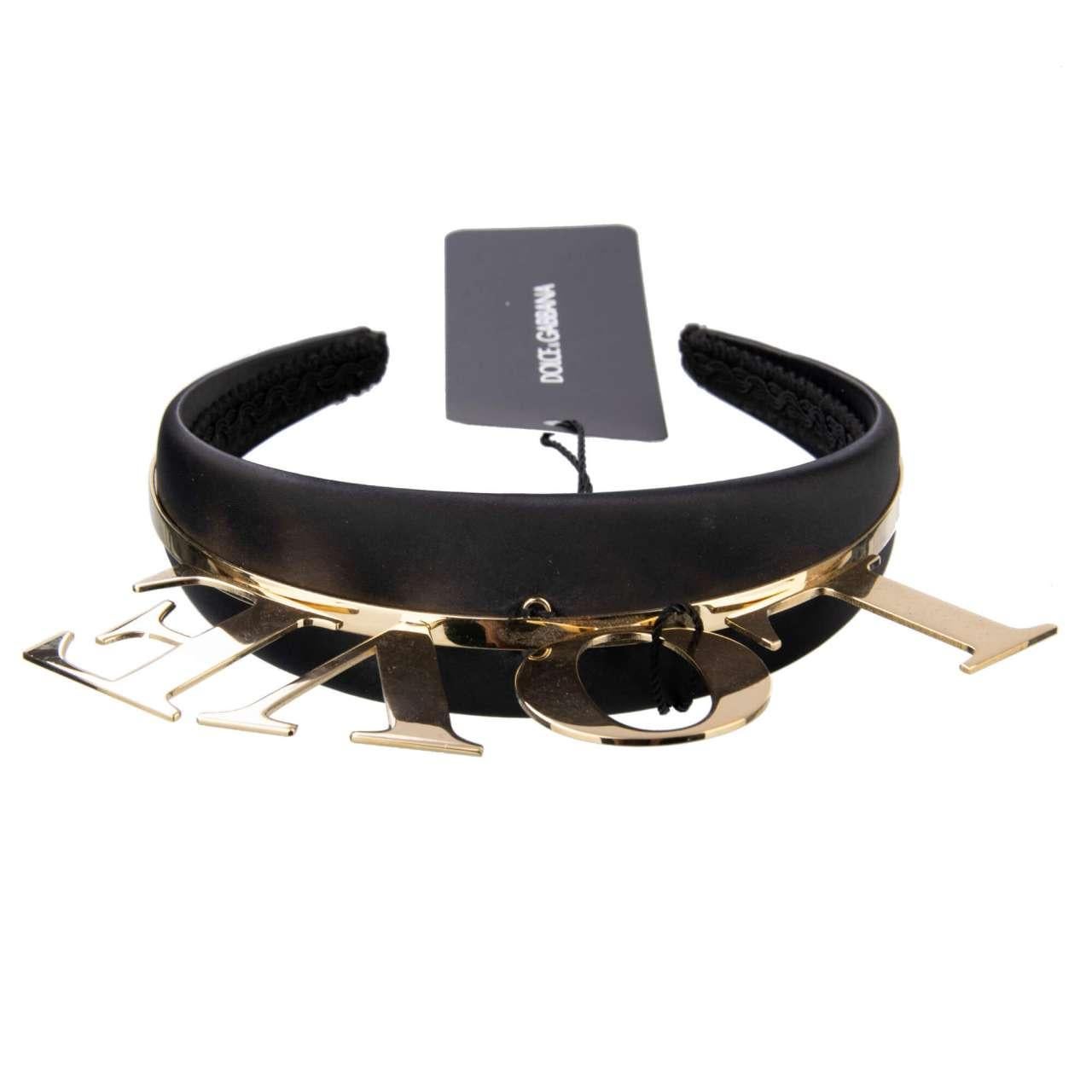- Hairband embelished with Brass Love Letters in black and gold by DOLCE & GABBANA - MADE IN ITALY - New with Tag - Modell: WHJ8S4-W1111-ZOO00 - Composition: 50% Nylon, 50% Brass - Color: Black / Gold - Dimensions: Letter 3 cm length, Hairband 4 cm