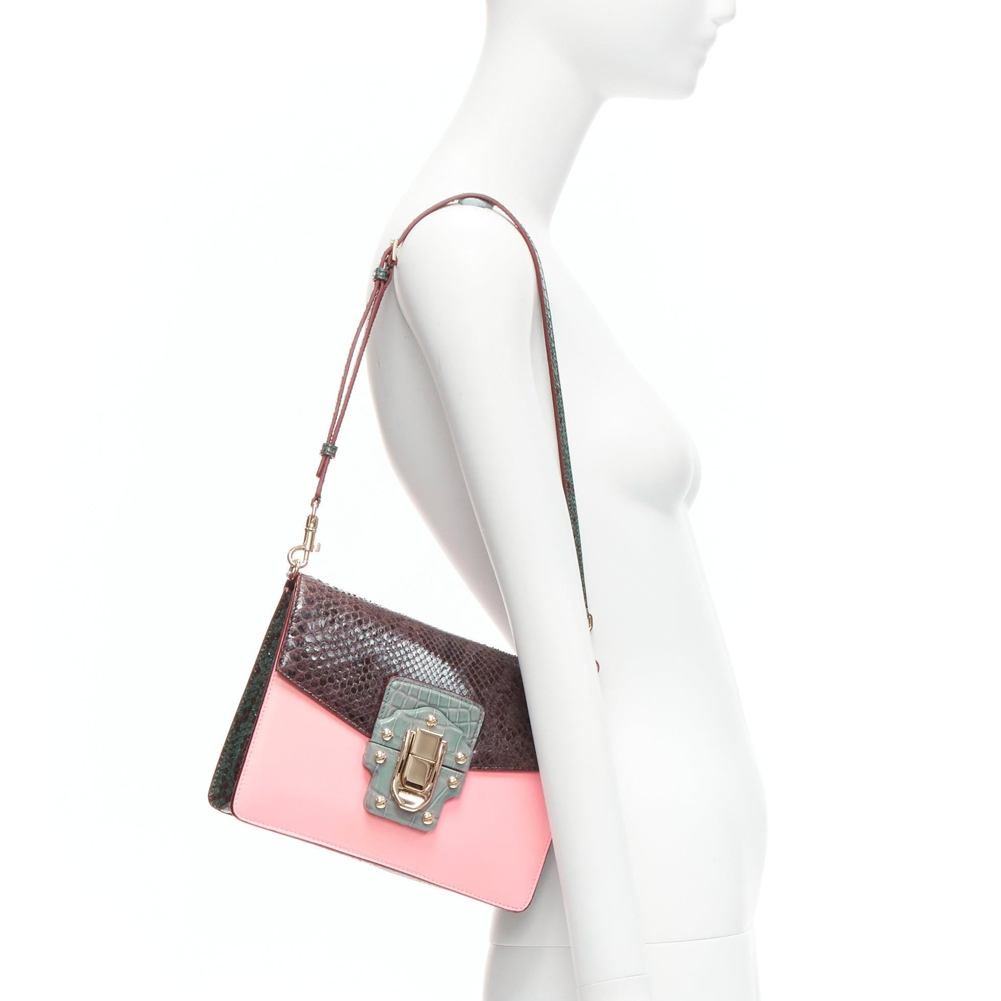 DOLCE GABBANA Lucia pink grey scaled leather flap clasp crossbody bag
Reference: TGAS/D00703
Brand: Dolce Gabbana
Designer: Domenico Dolce and Stefano Gabbana
Model: Lucia
Material: Leather
Color: Pink, Grey
Pattern: Animal Print
Closure: