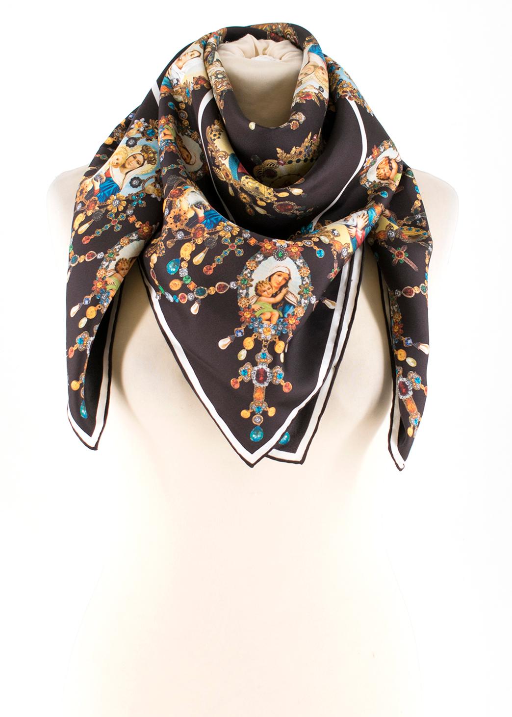 Dolce & Gabbana Madonna Print Silk Scarf

- Multi-coloured silk scarf
- Madonna print
- Stitched rolled edges
- Side logo print

Please note, these items are pre-owned and may show some signs of storage, even when unworn and unused. This is