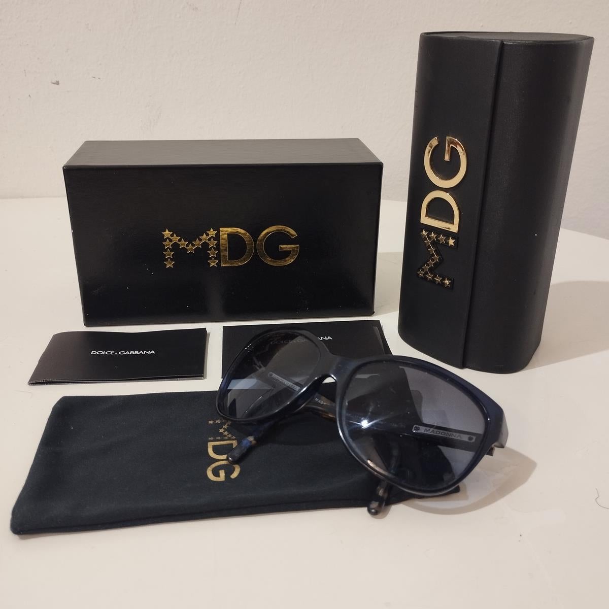 Special, limited and iconic DG sunglasses
Madonna Special Edition
DG 4097
Blue frames
Blue lenses (multiple signs on them)
Frame width cm 13,5 (5,3 inches)
With case and box
Fast shipping from Italy