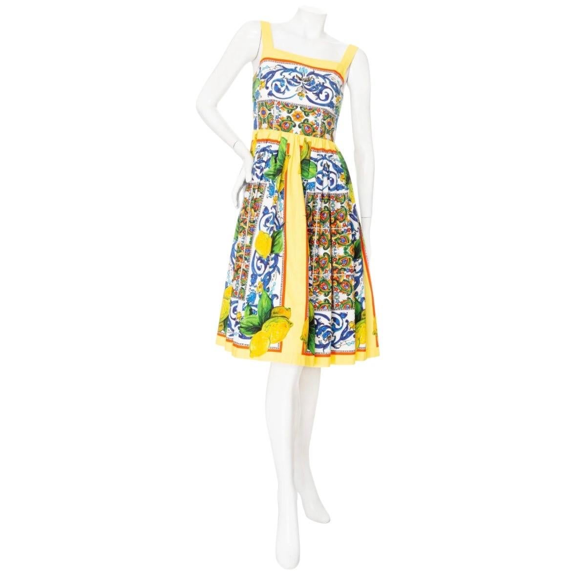 Dolce & Gabbana Majolica and Lemon Print Dress

Multicolored: yellow, green, blue, white, red
Majolica Sicilian-inspired tile and lemon print
Sleeveless
Square neckline
Fitted waist
Back zipper closure with hook and eye fastening
A-line, fit and