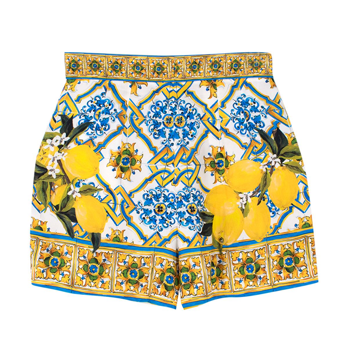 Dolce & Gabbana Majolica & Lemon-print Silk Shorts

- Multi-coloured silk shorts
- Lightweight
- Majolica and lemon-print
- High-rise waist
- Centre-front button and concealed zip fastening
- Front side pockets

Please note, these items are