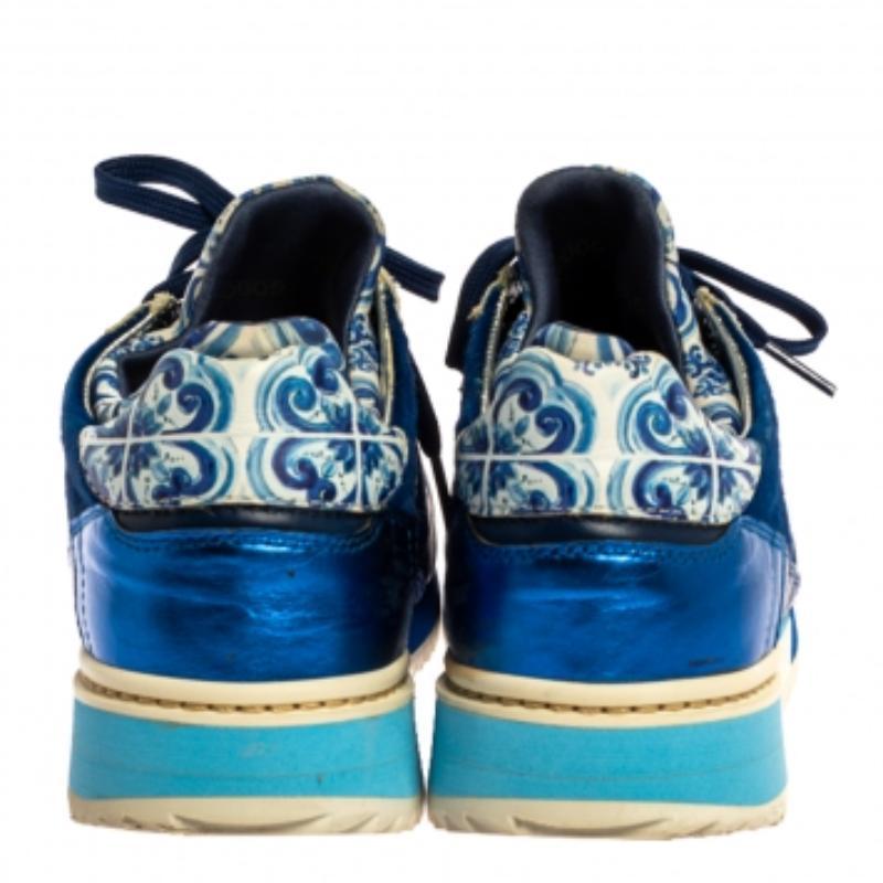 Flaunt your high-style with these cool sneakers from Dolce & Gabbana! They've been carefully crafted from leather and pony hair, and designed with signature Majolica trims, lace-up vamps and rubber platforms. You are sure to receive both comfort and