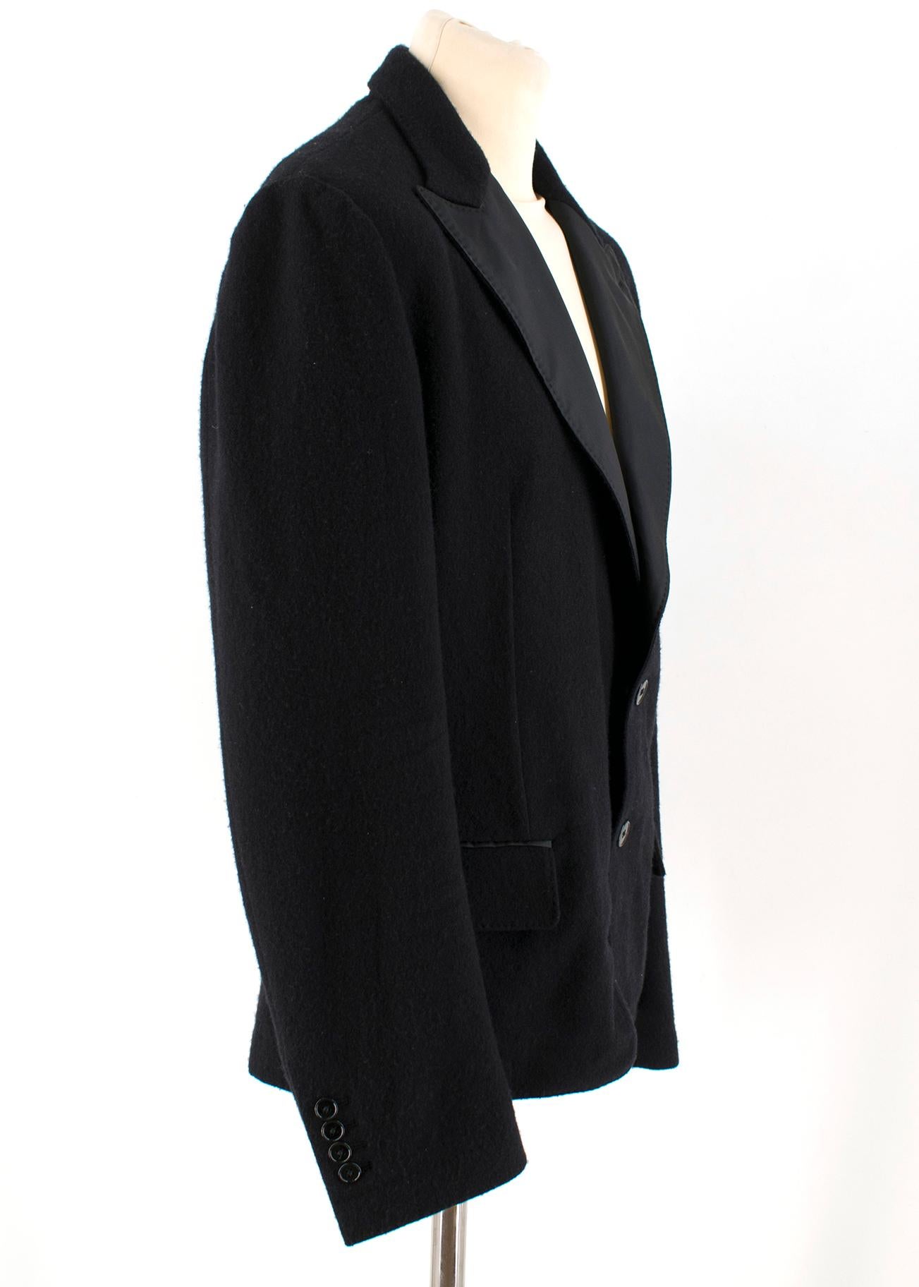 Dolce & Gabbana Black Wool-blend Jacket 

- Black Blazer Jacket
- Soft Wool blend fabric
- Satin peak lapels, single breasted 
- Dual front flap at front sides
- Internal side slip pockes, partially lined 
- 90% wool, 6% acetate, 4% polyamide