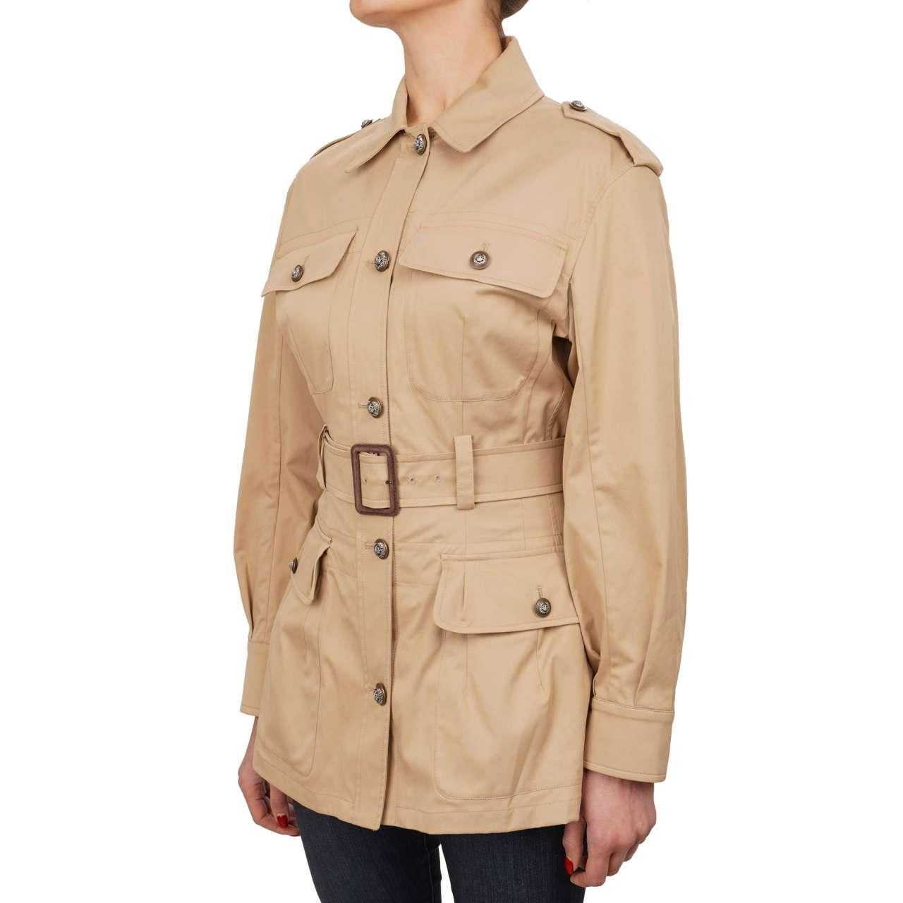 - Trench Coat Safari Jacket with metal crown buttons, belt and pockets by DOLCE & GABBANA - Former RRP: EUR 1.550 - New with tag - Slim Fit - MADE IN ITALY - Model: F28VAT-FUFJ9-S9403 - Material: 97% Cotton, 3% Elastan - Color: Beige - Large picture