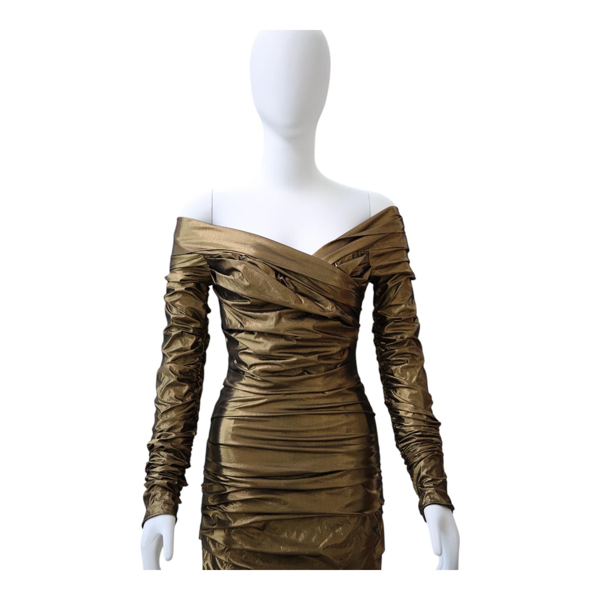 Dolce & Gabbana Metallic Bronze Ruched Off-Shoulder Dress

Bold, sculptural, and unmistakably Dolce & Gabbana, this figure-hugging cocktail dress delivers high drama in a metallic bronze finish. Designed in a structured taffeta fabric, the piece