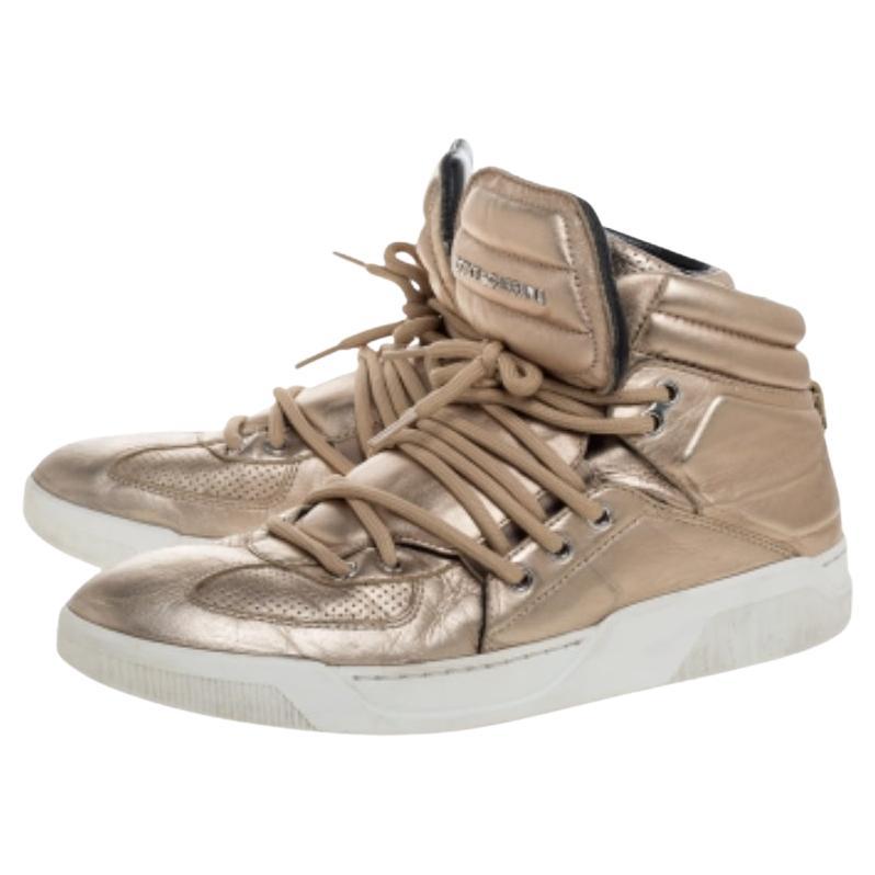 You return to Dolce & Gabanna time and again for fun, quirky styles accompanied by superior construction, and both of these are explicitly demonstrated in these high-top sneakers. They are crafted from leather and have a metallic gold exterior.