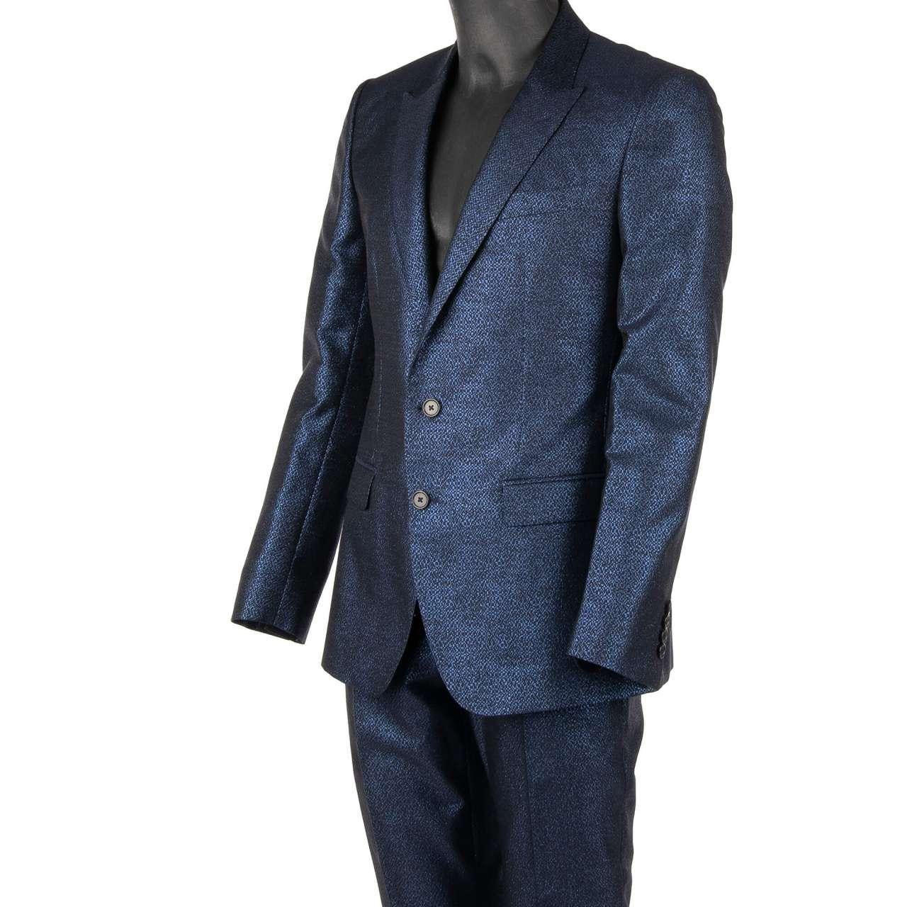 - Metallic jacquard suit with peak lapel in blue and black by DOLCE & GABBANA - MARTINI Model - RUNWAY - Dolce & Gabbana Fashion Show - New with tag - Former RRP: EUR 2,250 - MADE in ITALY - Slim Fit - Model: GK0RMT-FJM52-S8354 - Material: 43%