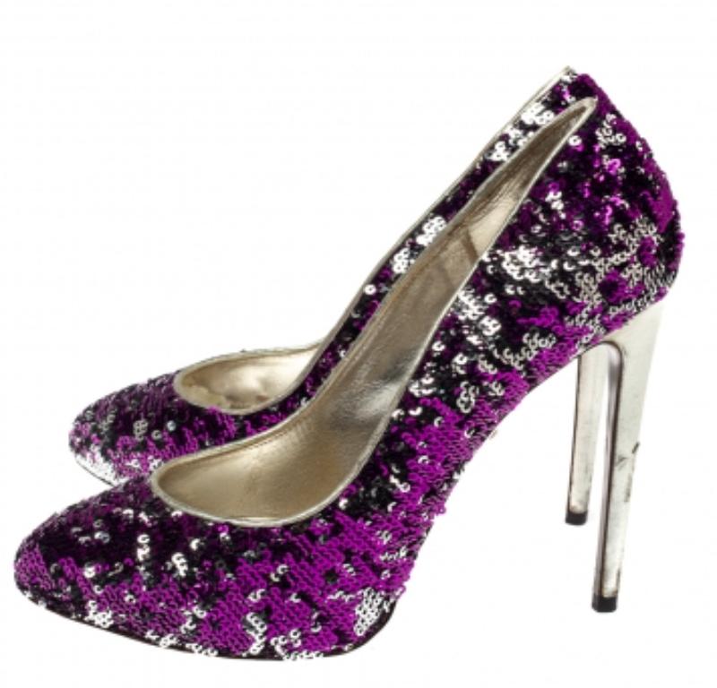 Be ready to catch the light whenever you step out in this pair of pumps by Dolce & Gabbana. They are covered in sequins and balanced on 12.5 cm heels. You can glitter away at evening parties with this stunning pair.