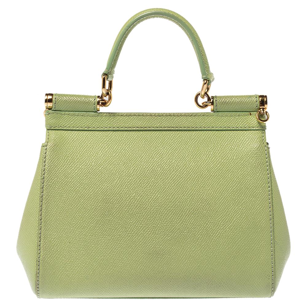 The Miss Sicily tote is one of the most celebrated creations from Dolce & Gabbana. The tote beautifully embodies the spirit of extravagance and feminity that the Italian luxury brand carries. Crafted from mint green leather, the bag has a relaxed