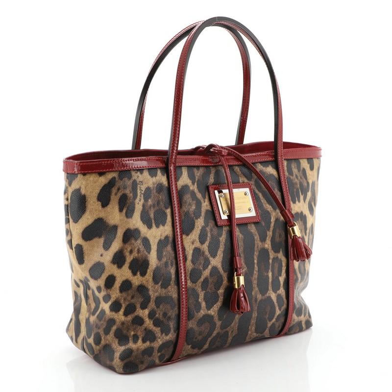Dolce & Gabbana Miss Escape Open Tote Printed Coated Canvas Medium 

Condition: Very good. Loss of shape on exterior and handles, light scuffs on base, slight cracking on handle base wax edges. Minor wear in interior, scratches on