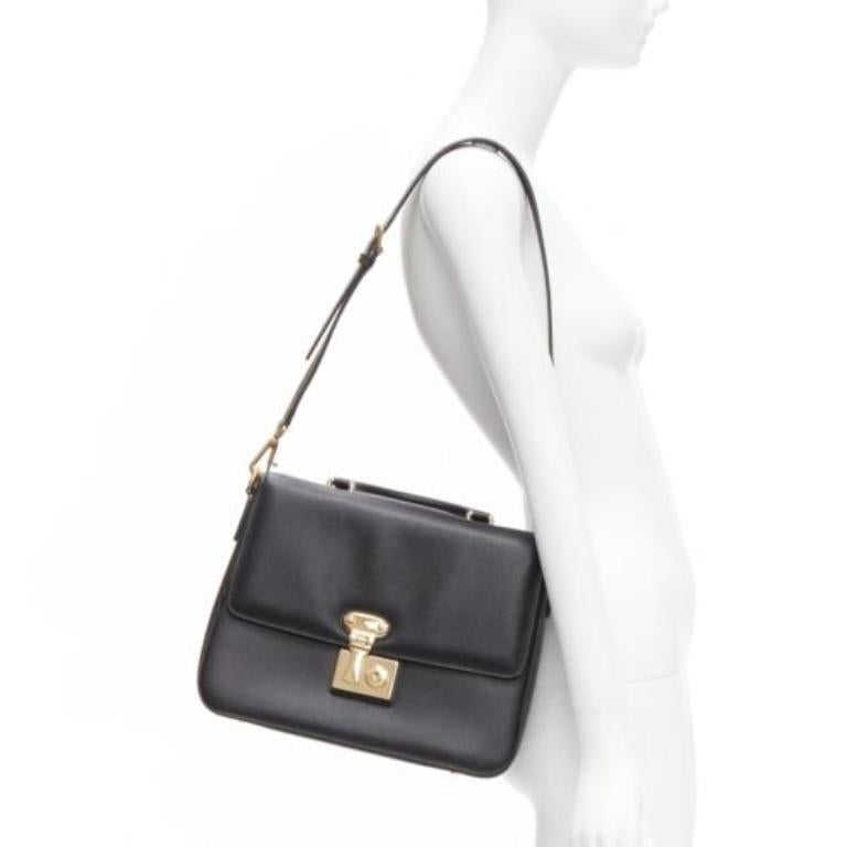 DOLCE GABBANA Miss Linda black saffiano leather gold buckle flap bag
Reference: TGAS/D00681
Brand: Dolce Gabbana
Designer: Domenico Dolce and Stefano Gabbana
Model: Miss Linda
Collection: Runway
Material: Leather
Color: Black, Gold
Pattern: