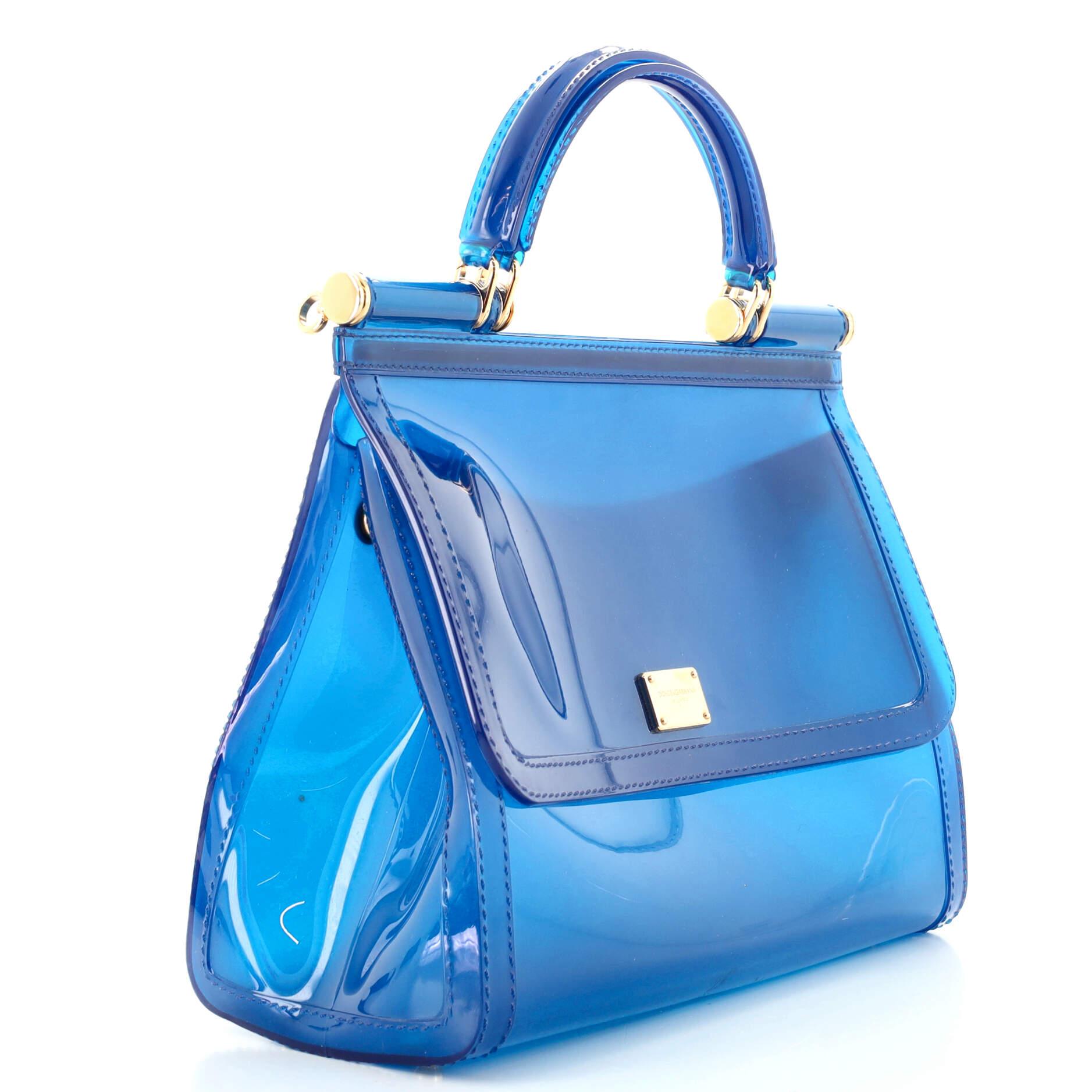 Condizioni: Buono. Usura, graffi e segni pesanti sull'esterno, sulla maniglia e all'interno, usura, scolorimento e piccole macchie sul cinturino, graffi sulla minuteria.
Accessori: Con cinghia
Misure: Altezza 9