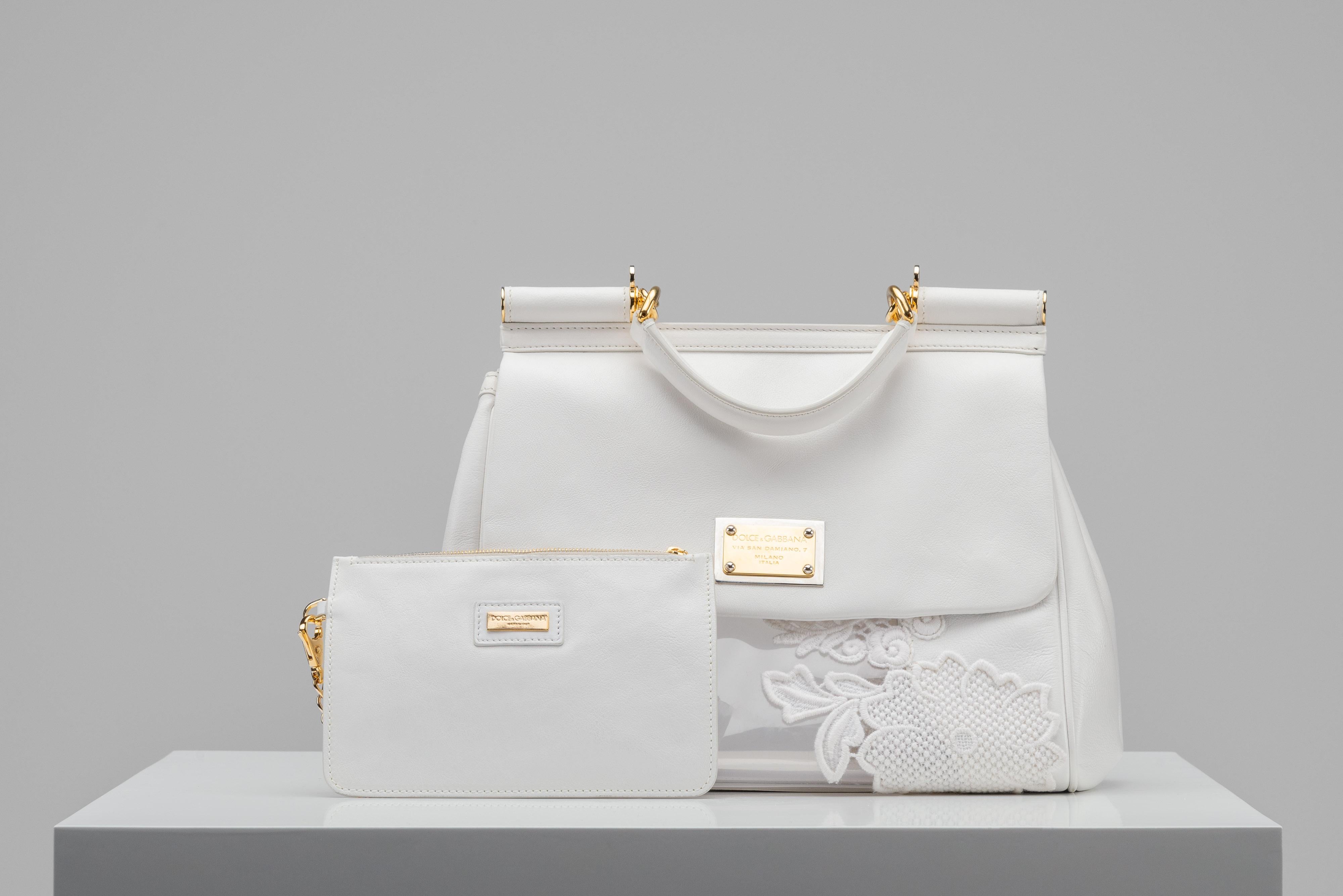From the collection of SAVINETI we offer this Dolce & Gabbana Sicily Bag:
- Brand: Dolce & Gabbana
- Model: Sicily
- Color: White
- Condition: Good Condition
- Materials: dauphine leather

Authenticity is our core value at SAVINETI and this process