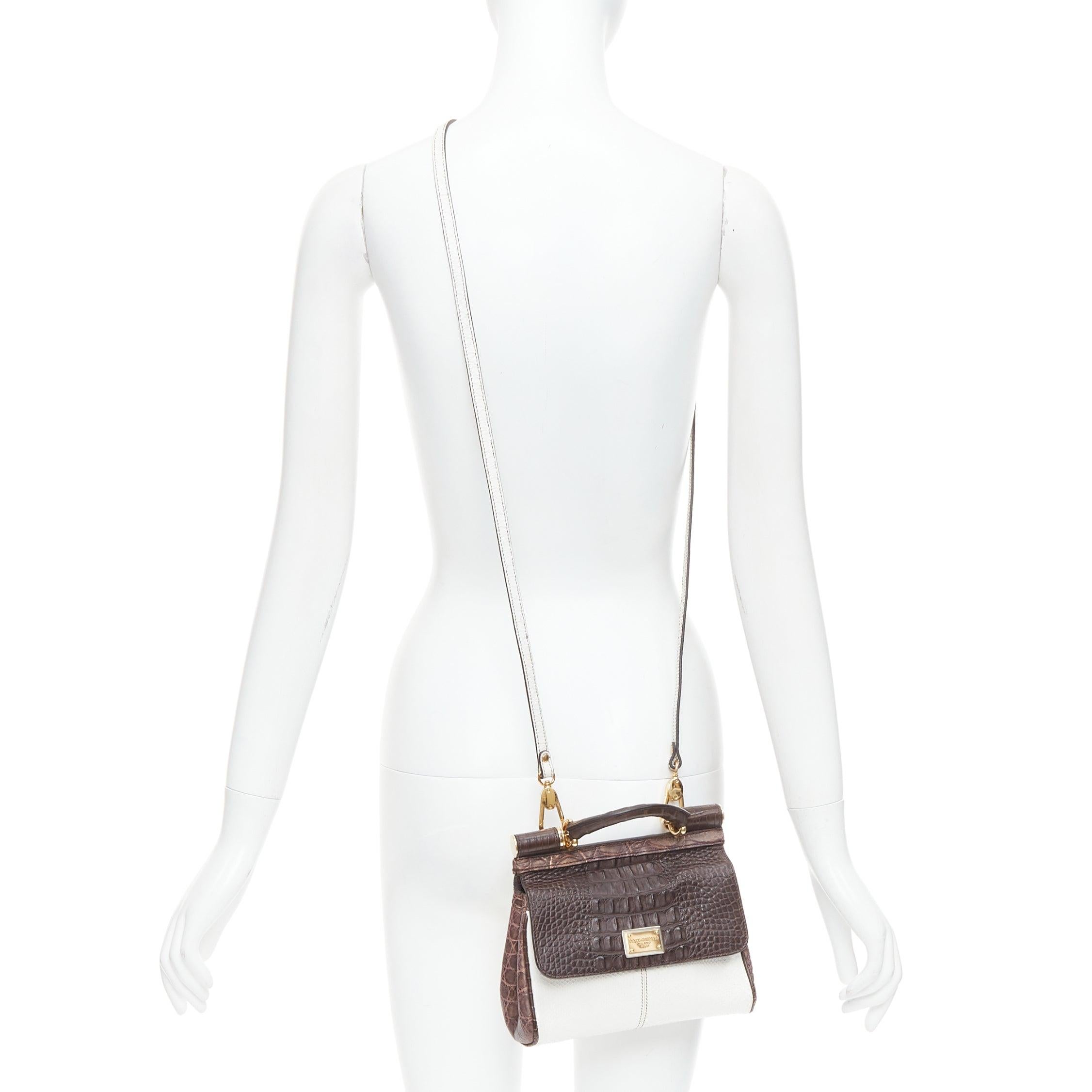 DOLCE GABBANA Miss Sicily brown white mixed scaled leather crossbody bag
Reference: TGAS/E00708
Brand: Dolce Gabbana
Designer: Domenico Dolce and Stefano Gabbana
Model: Miss Sicily
Material: Leather
Color: Brown, White
Pattern: Animal Print
Closure: