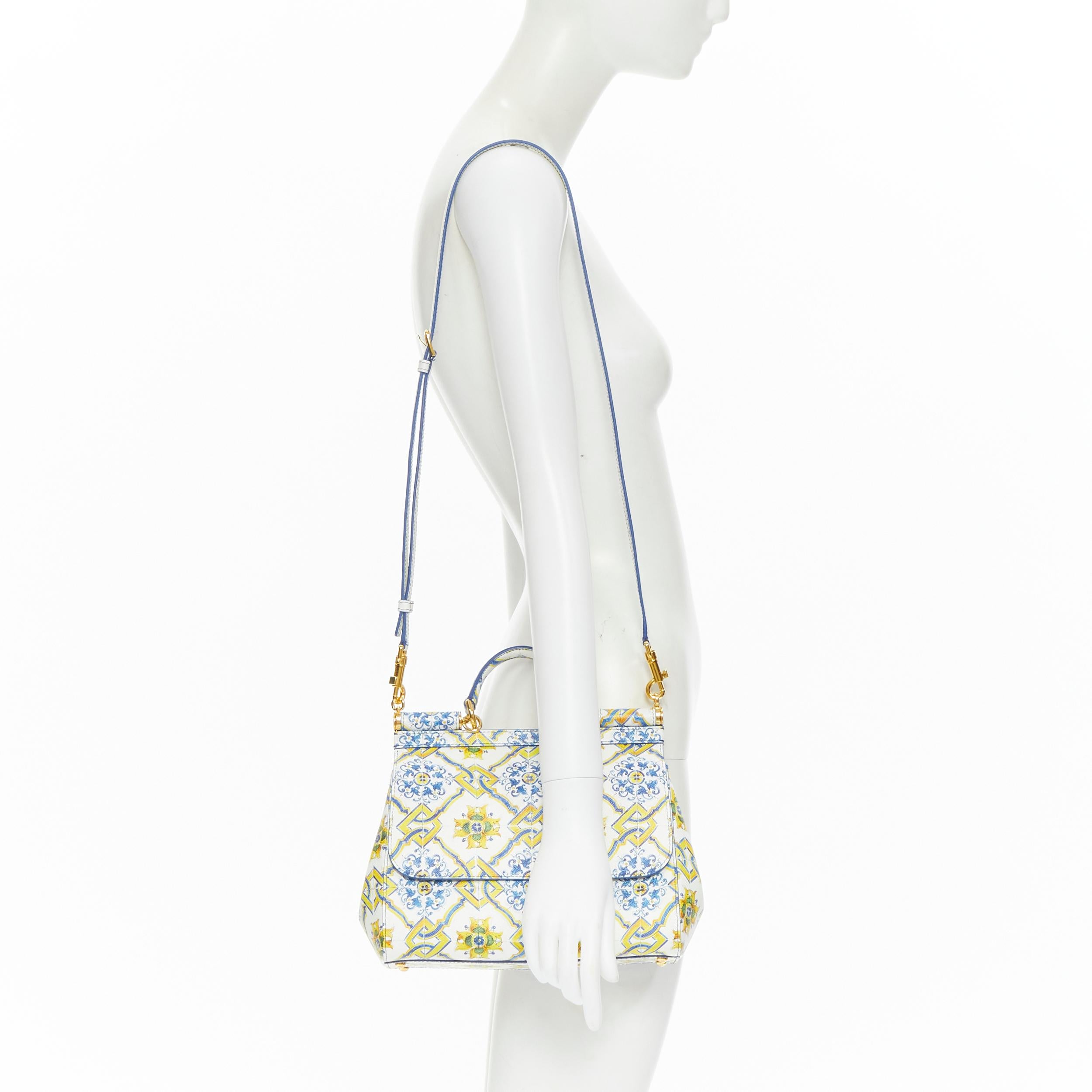 DOLCE GABBANA MIss Sicily Majolica Ceramic print leather top handle satchenl bag
Reference: TGAS/B01363
Brand: Dolce Gabbana
Model: Majolica Miss Sicily
Material: Leather
Color: White
Pattern: Abstract
Closure: Magnet
Extra Detail: Miss Sicily.