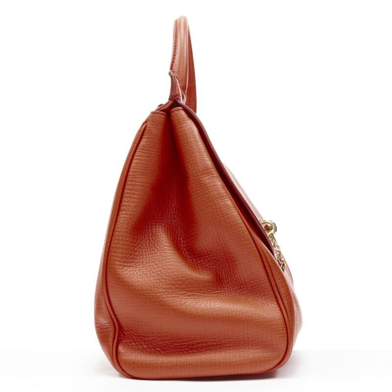 DOLCE GABBANA Monica, borsa a tracolla in pelle arancione con chiusura a scatto in oro In condizioni buone in vendita a Hong Kong, NT