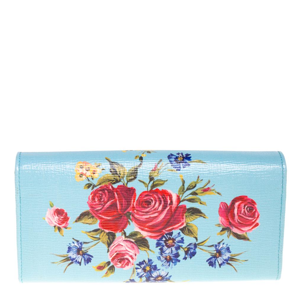 Grab this stylish and colorful wallet from the house of Dolce & Gabbana. It has been crafted in Italy and made from quality leather, It carries a lovely floral print, a front flap that opens elegantly to a leather & fabric interior equipped with