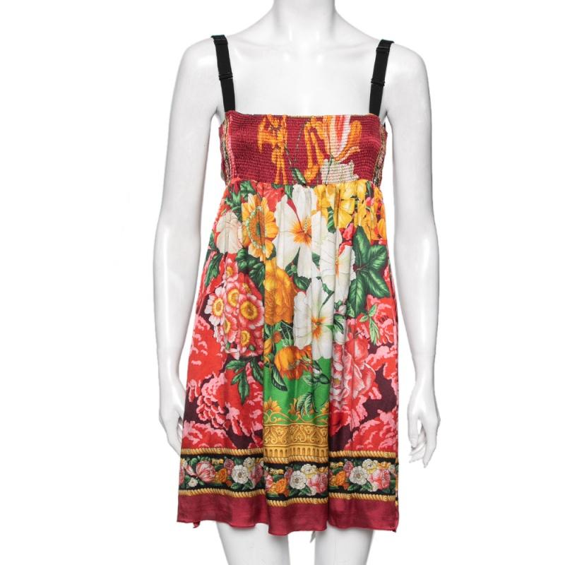 Feel your stylish best wearing this mini dress from Dolce and Gabbana. It is stitched from silk and is multicolored with gorgeous floral prints all over. Pair the sleeveless dress with flats or even heels!

