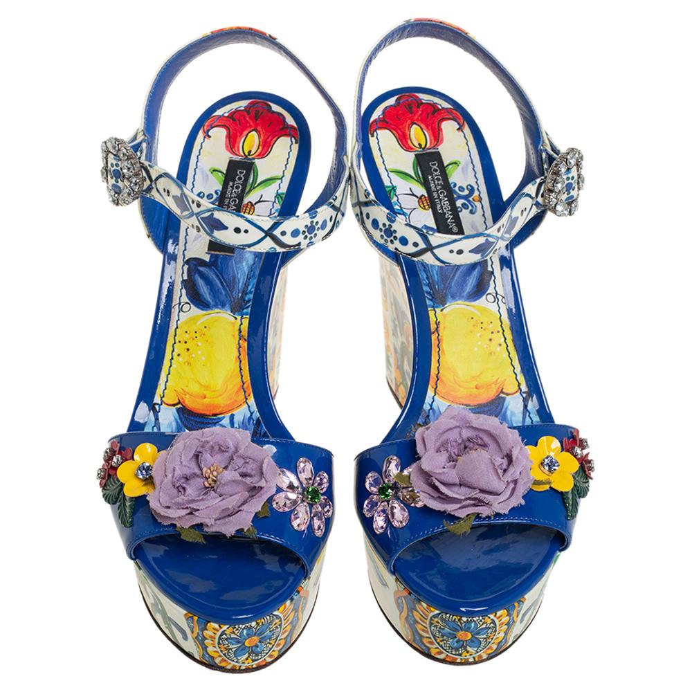 Instantly recognizable, brightly hued, and chic, these Dolce & Gabbana sandals bring out the label's Italian sensibilities. They are made from leather and feature the label's signature Majolica print all over. These beauties are adorned with floral