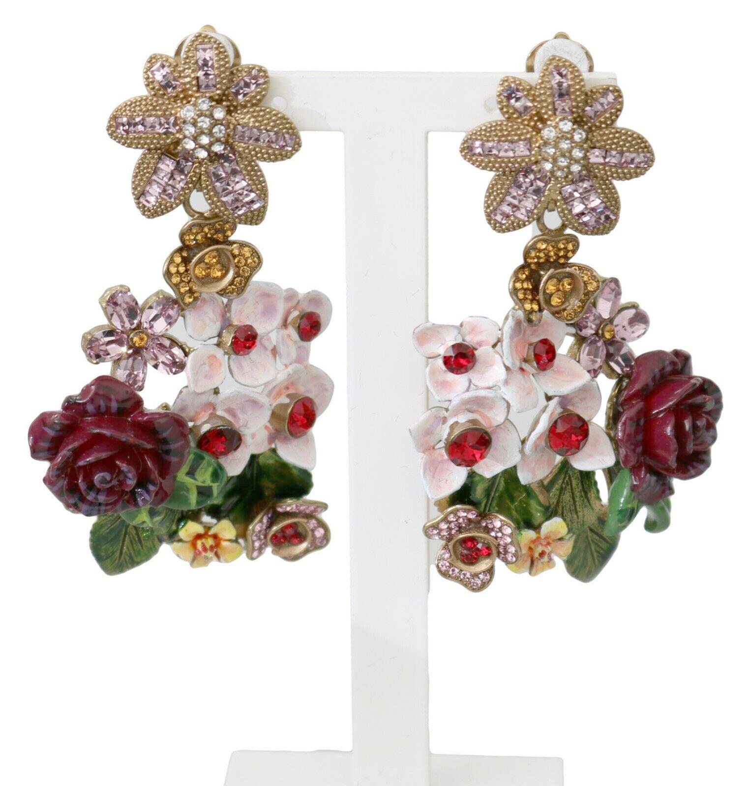 Gorgeous brand new with tags, 100% authentic Dolce & Gabbana earrings.

Model: Clip-on, dangling
Pattern: flowers
Material: 60% Brass, 20% Glass, 20% Crystals

Color: Gold, White, Green
Crystals: Violet, Red, Gold
Logo details
Made in Italy

Length: