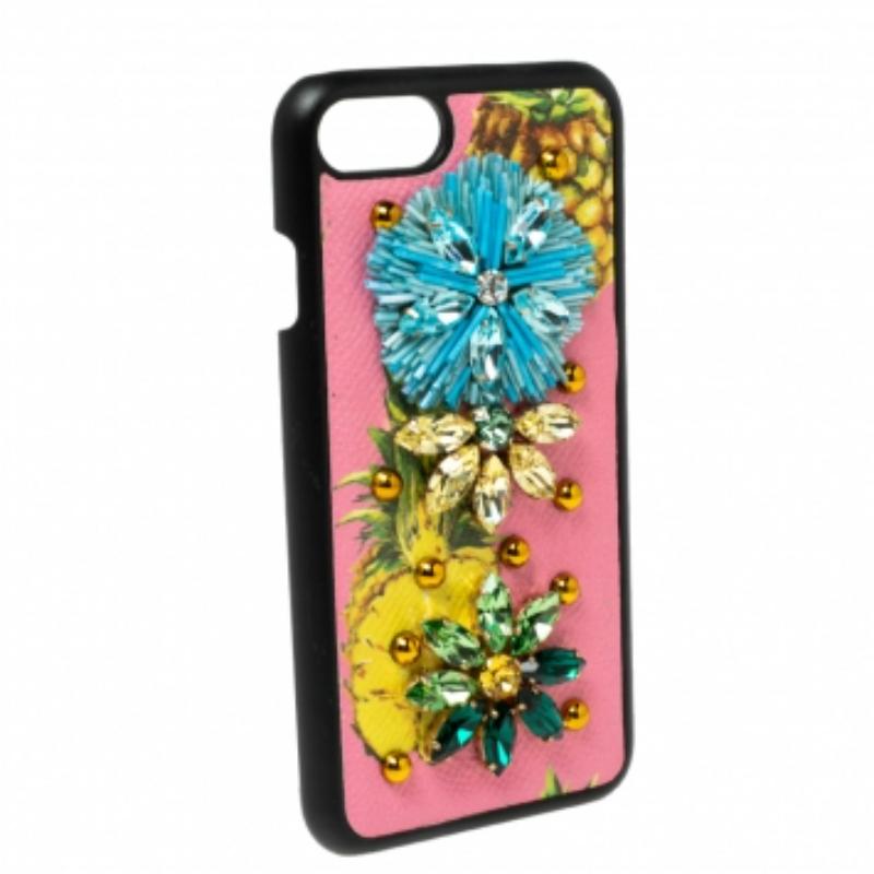 Keep your iPhone 7 safe and stylish in this cover from the House of Dolce & Gabbana. It is made from multicolored leather, with crystal-embellishments and Pineapple prints elevating its beauty. It has an Alcantara-lining and gold-tone hardware.