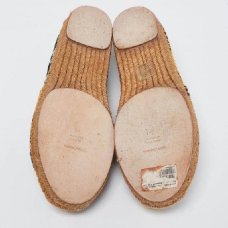 Step out in style this summer with these vibrant espadrilles from Dolce & Gabbana. Featuring lemon prints on the fabric exterior, this trendy round-toe pair has braided espadrille detailing. Soak up the sun by slipping these on with shorts or pastel