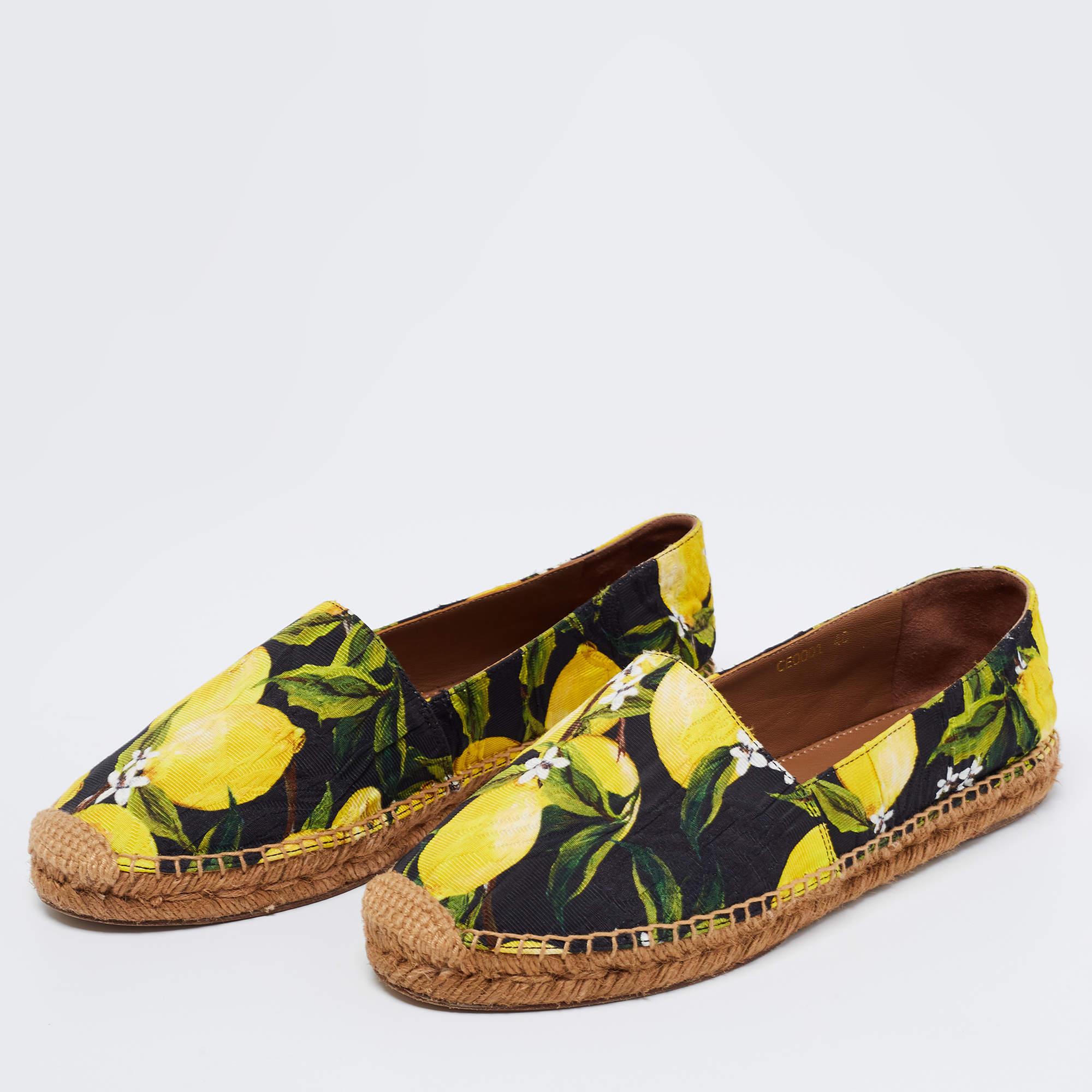 Step out in style this summer with these vibrant espadrilles from Dolce & Gabbana. Featuring lemon prints on the fabric exterior, this trendy round-toe pair has braided espadrille detailing. Soak up the sun by slipping these on with shorts or pastel