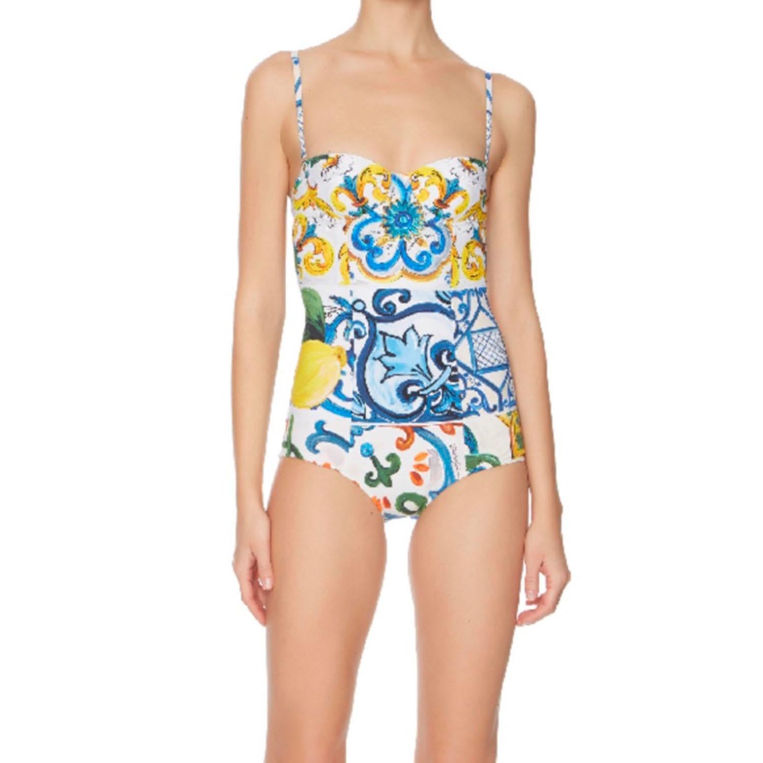 Dolce & Gabbana romantic full swimsuit with a built-in balcony bra made from precious fabric in the MAJOLICA print has an extraordinarily sensual look. Perfect for both the poolside and as a top for a cocktail party:
Underwired bra with padded