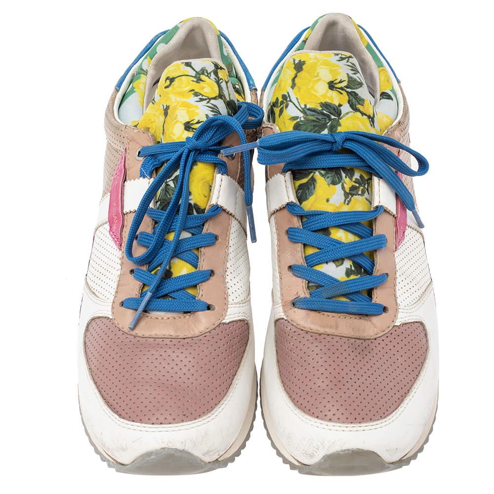 These attractive low-top sneakers from Dolce & Gabbana add an edge of color and fun to your ensemble with their fancy exterior and effortless style. They are created using multicolored patchwork leather and fabric with lace-up details and sturdy